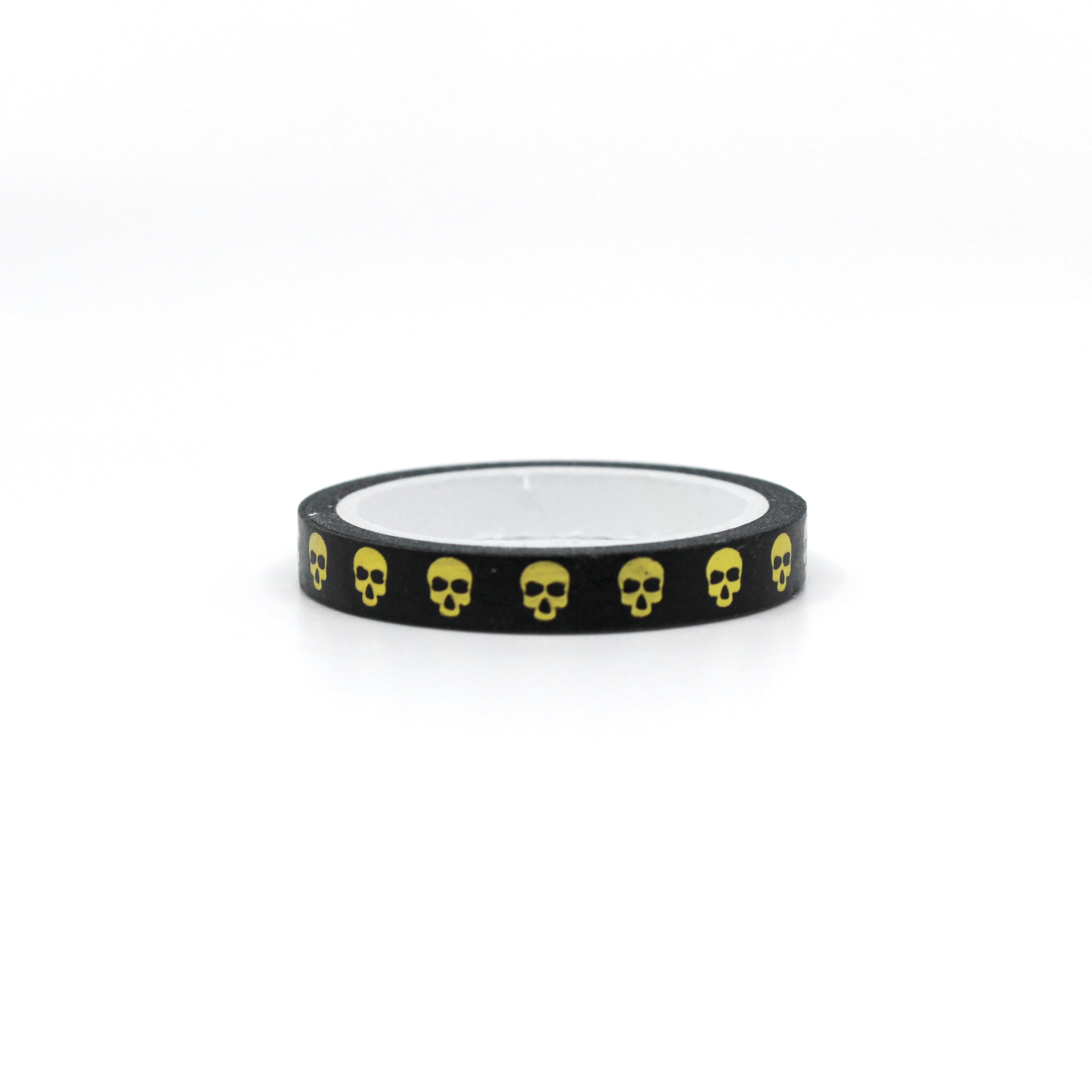 Elevate your crafts with our black and gold foil narrow skull washi tape, featuring intricate skull designs in a bold and elegant combination of colors, perfect for adding a touch of edgy sophistication to your projects. This tape is sold at BBB Supplies Craft Shop.