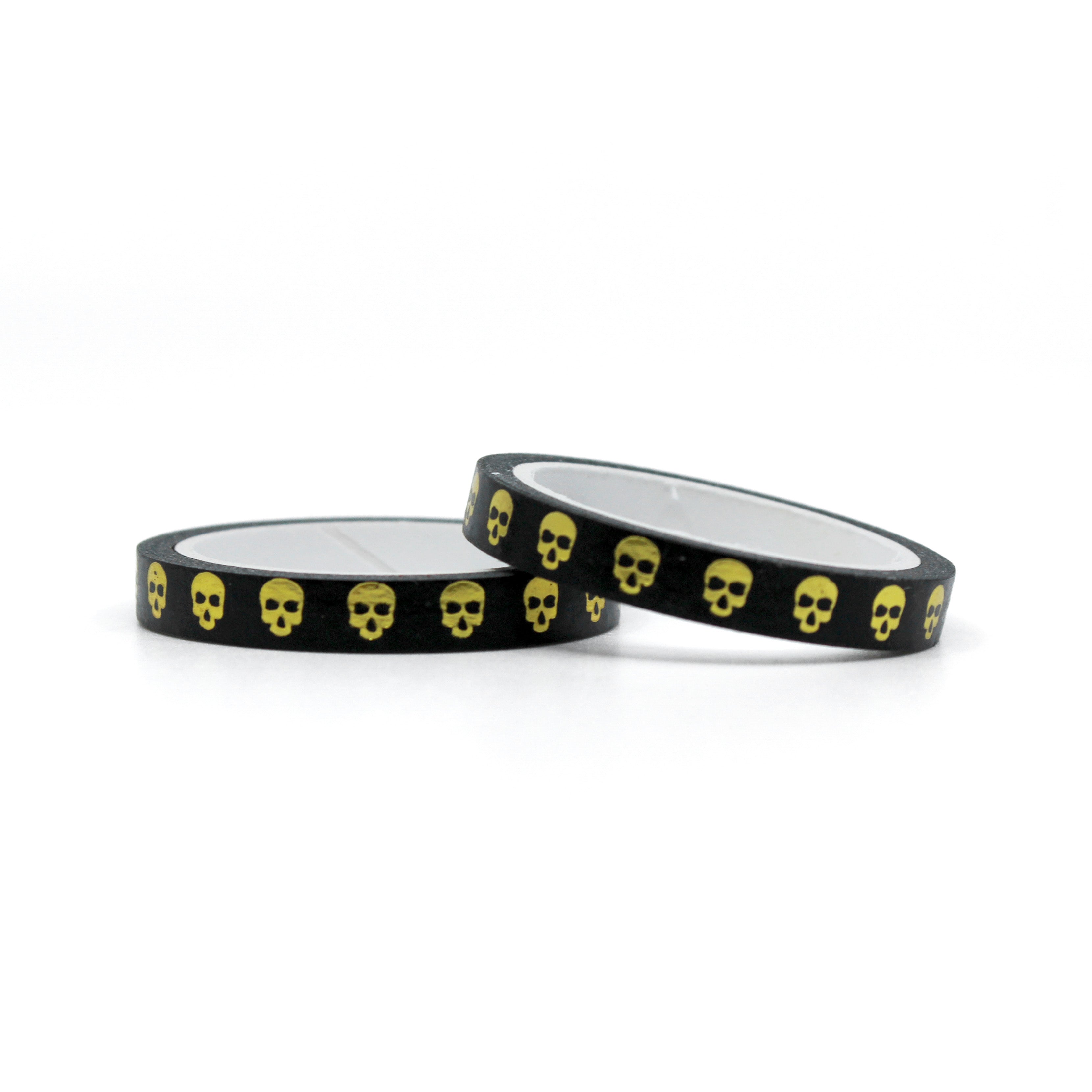 Elevate your crafts with our black and gold foil narrow skull washi tape, featuring intricate skull designs in a bold and elegant combination of colors, perfect for adding a touch of edgy sophistication to your projects. This tape is sold at BBB Supplies Craft Shop.