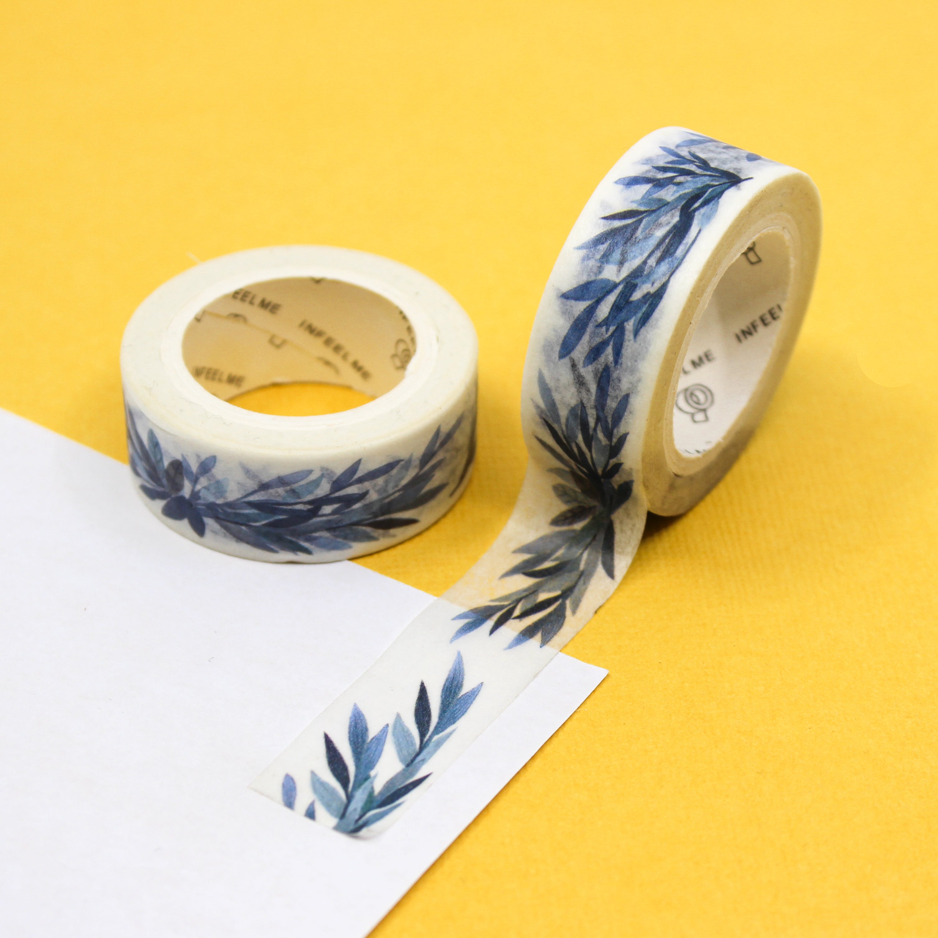 Enhance your crafts with our Blue Laurel Bouquet Washi Tape, adorned with a lush bouquet of laurel leaves. Ideal for adding a touch of natural elegance to your projects. This tape is sold at BBB Supplies Craft Shop.