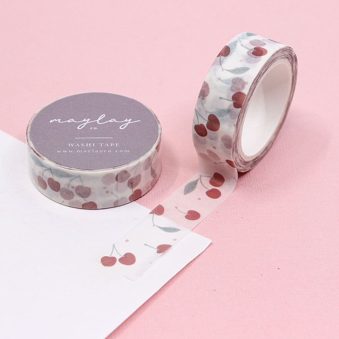 "Crisp White Cherry Washi Tape" features bright red cherries on a clean white background, perfect for adding a pop of fresh, fruity flair to your planners, journals, and crafts.