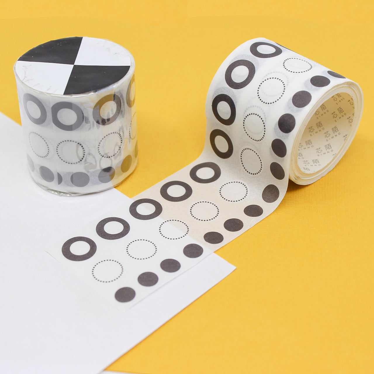 Stay organized with our Black and White Checklist Washi Tape, featuring a classic checklist design in a timeless black and white palette. Ideal for adding a functional and stylish touch to your planner or projects. This tape is sold at BBB Supplies Craft Shop.