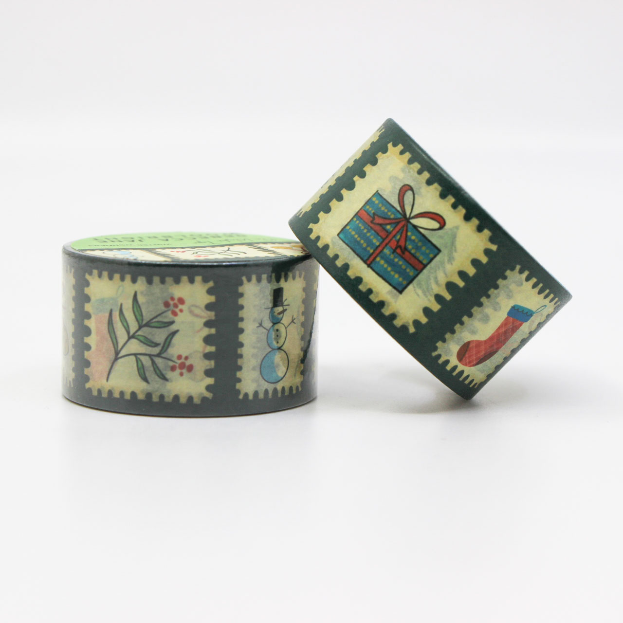 Holiday washi tape featuring snowflakes and festive stamps