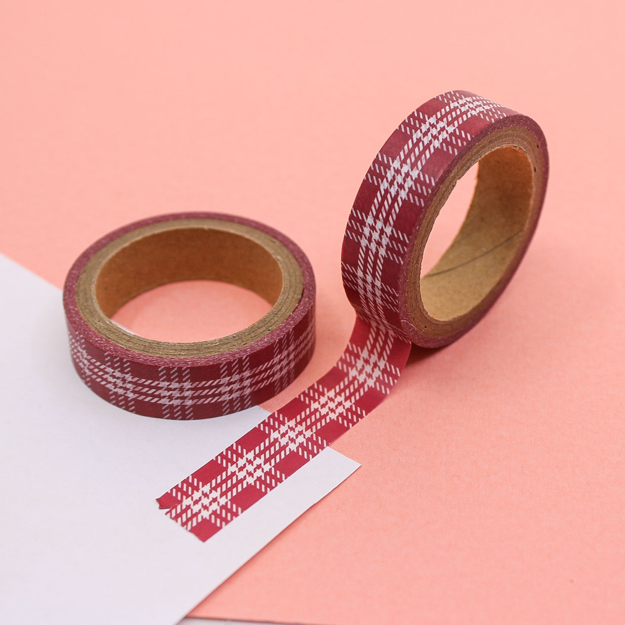 Plaid patterned craft tape for journals and scrapbooking shown in use.