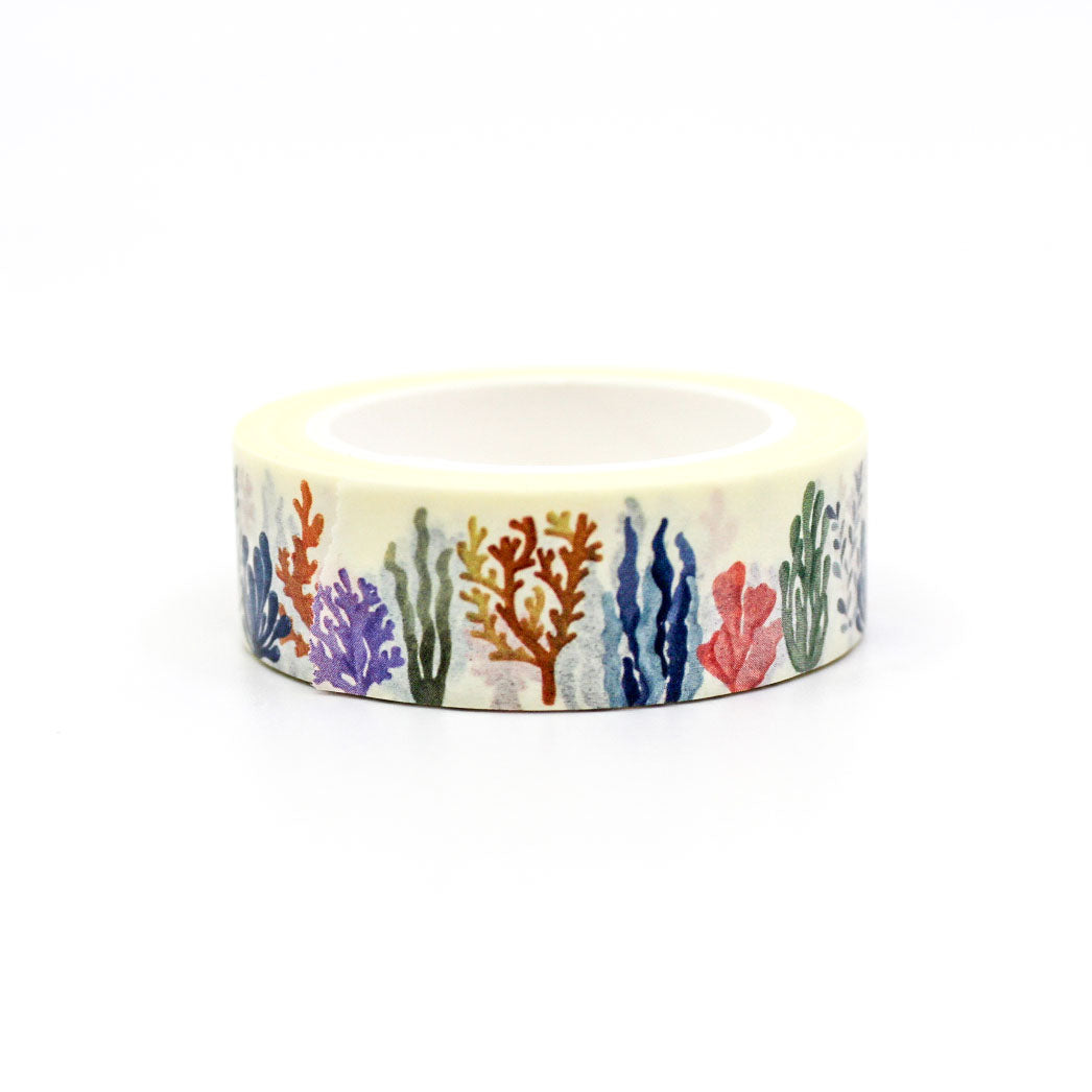 Colorful coral reef washi tape featuring a vibrant pattern of coral in shades of orange, pink, blue, and purple, perfect for decorating journals, planners, and craft projects.