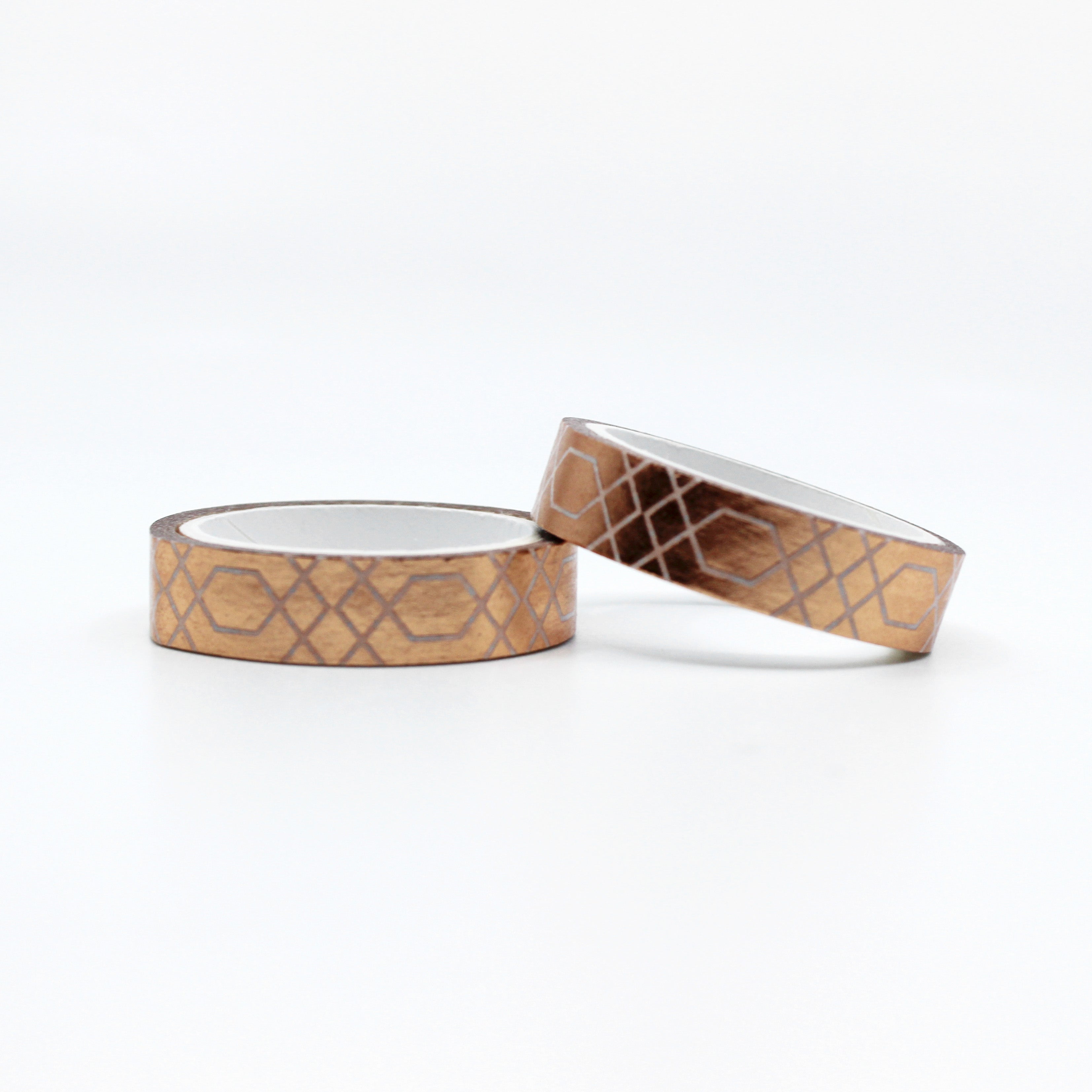 Elevate your crafts with this elegant copper foil washi tape featuring a decorative border scroll design. Perfect for adding a touch of sophistication to your scrapbooking, journaling, or card making projects. This tape is sold at BBB Supplies Craft Shop.