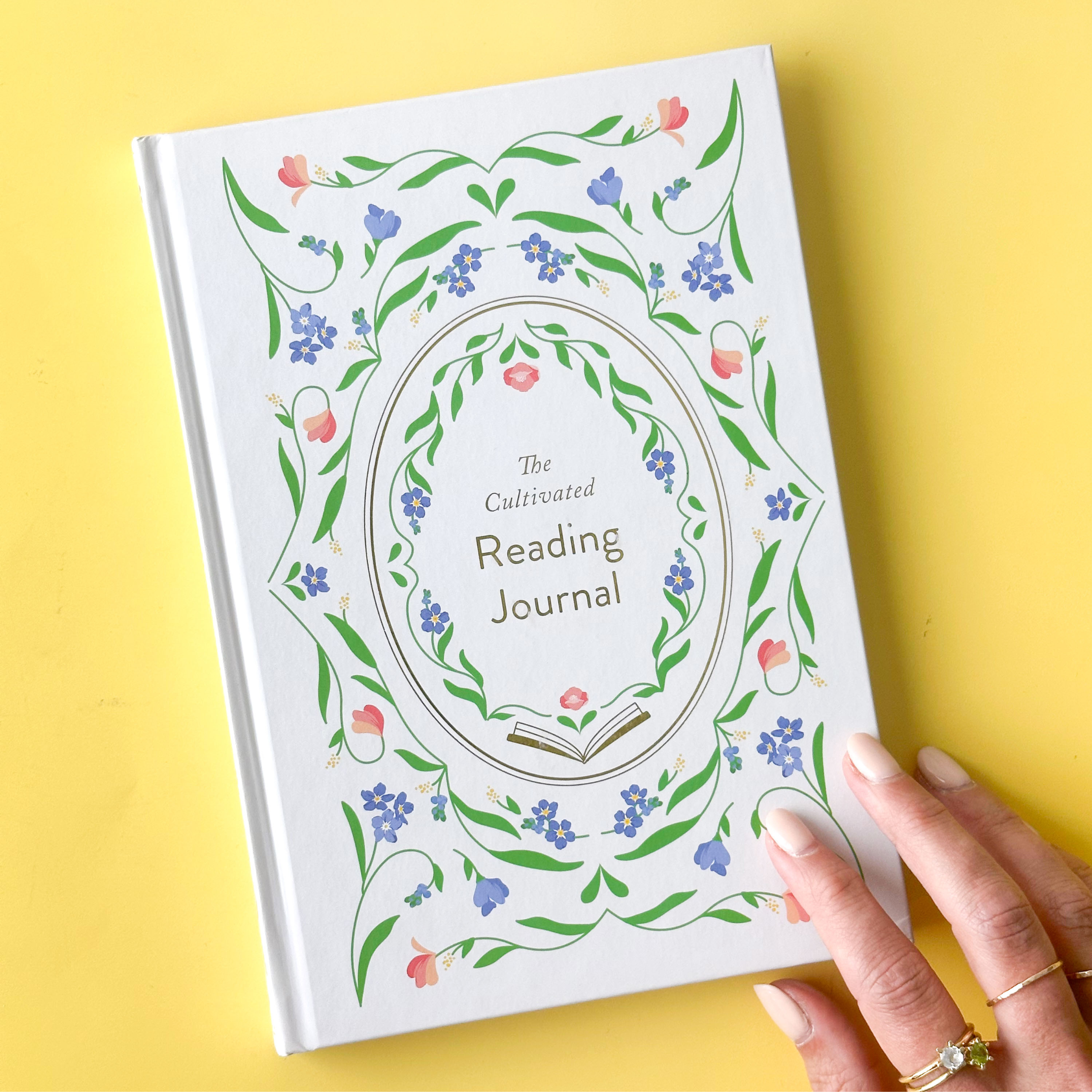 The Cultivated Reading Journal: A thoughtfully designed reading companion for book lovers, featuring space for reviews, reflections, and memorable quotes. This journal is sold at BBB Supplies Craft Shop.