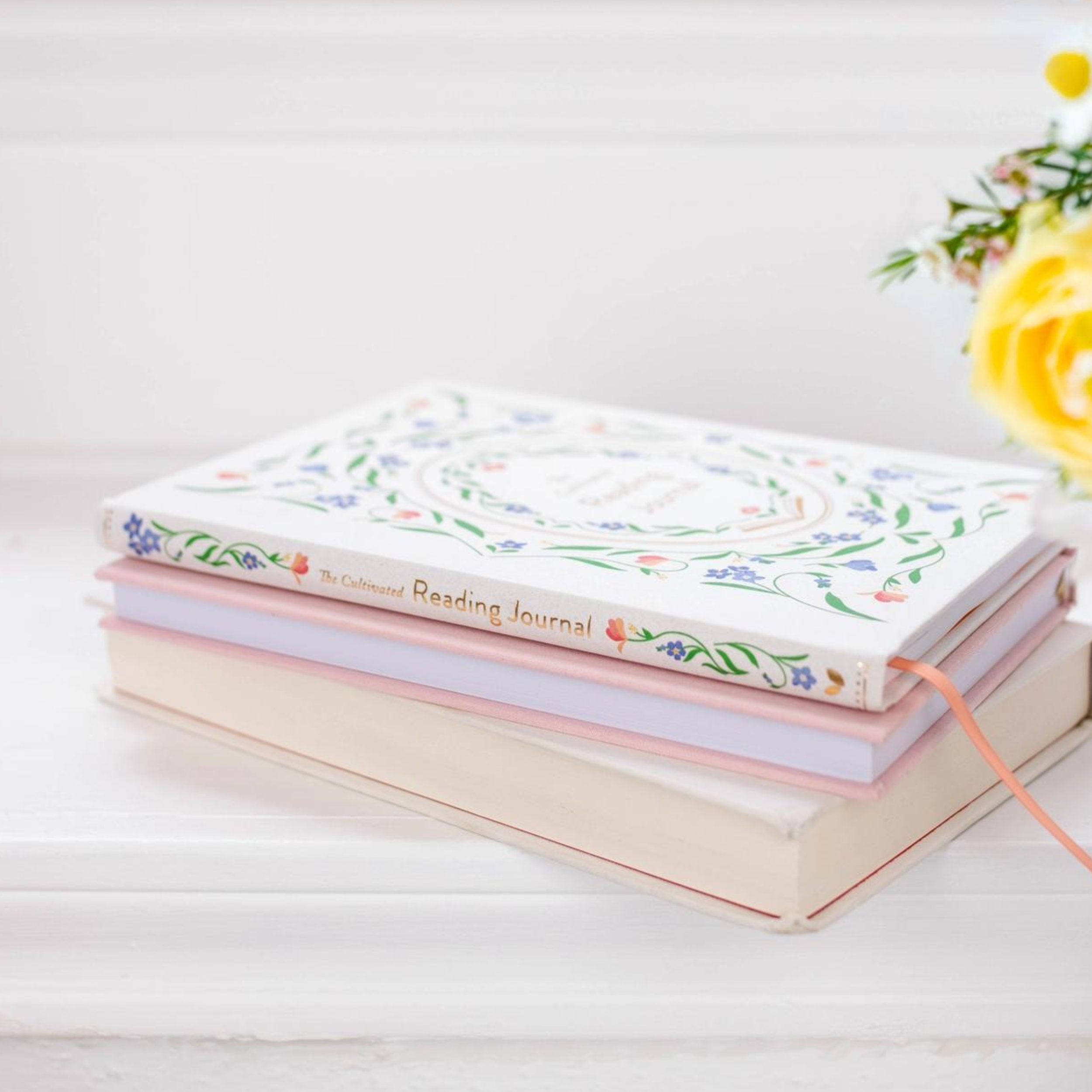 The Cultivated Reading Journal: A thoughtfully designed reading companion for book lovers, featuring space for reviews, reflections, and memorable quotes. This journal is sold at BBB Supplies Craft Shop.
