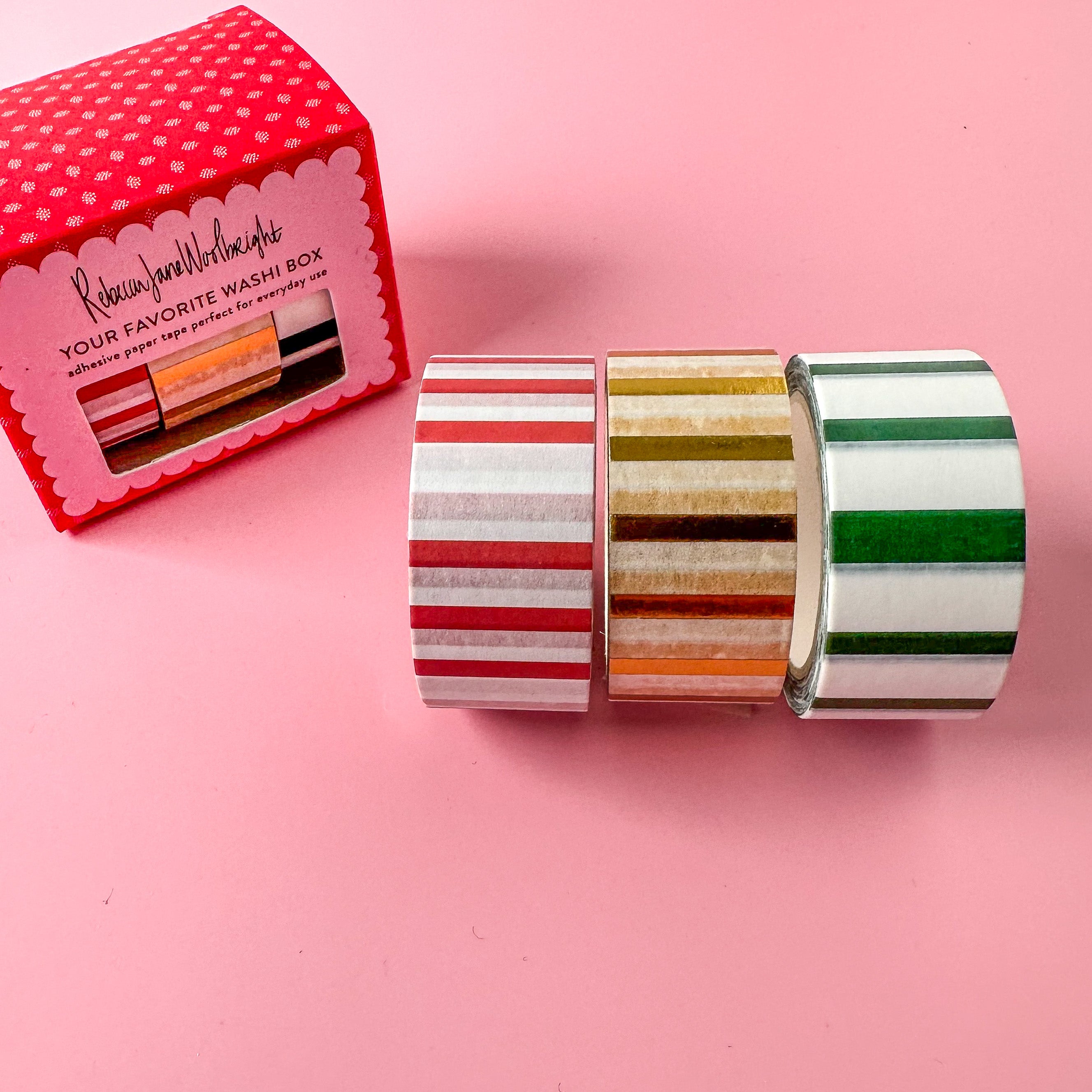 Favorites Holiday Stripe Washi Tape Set featuring a vibrant mix of festive stripes in traditional Christmas colors, ideal for adding a joyful and decorative touch to your holiday-themed crafts and projects. This set is from Rebecca Jane Woolbright and sold at BBB Supplies Craft Shop.