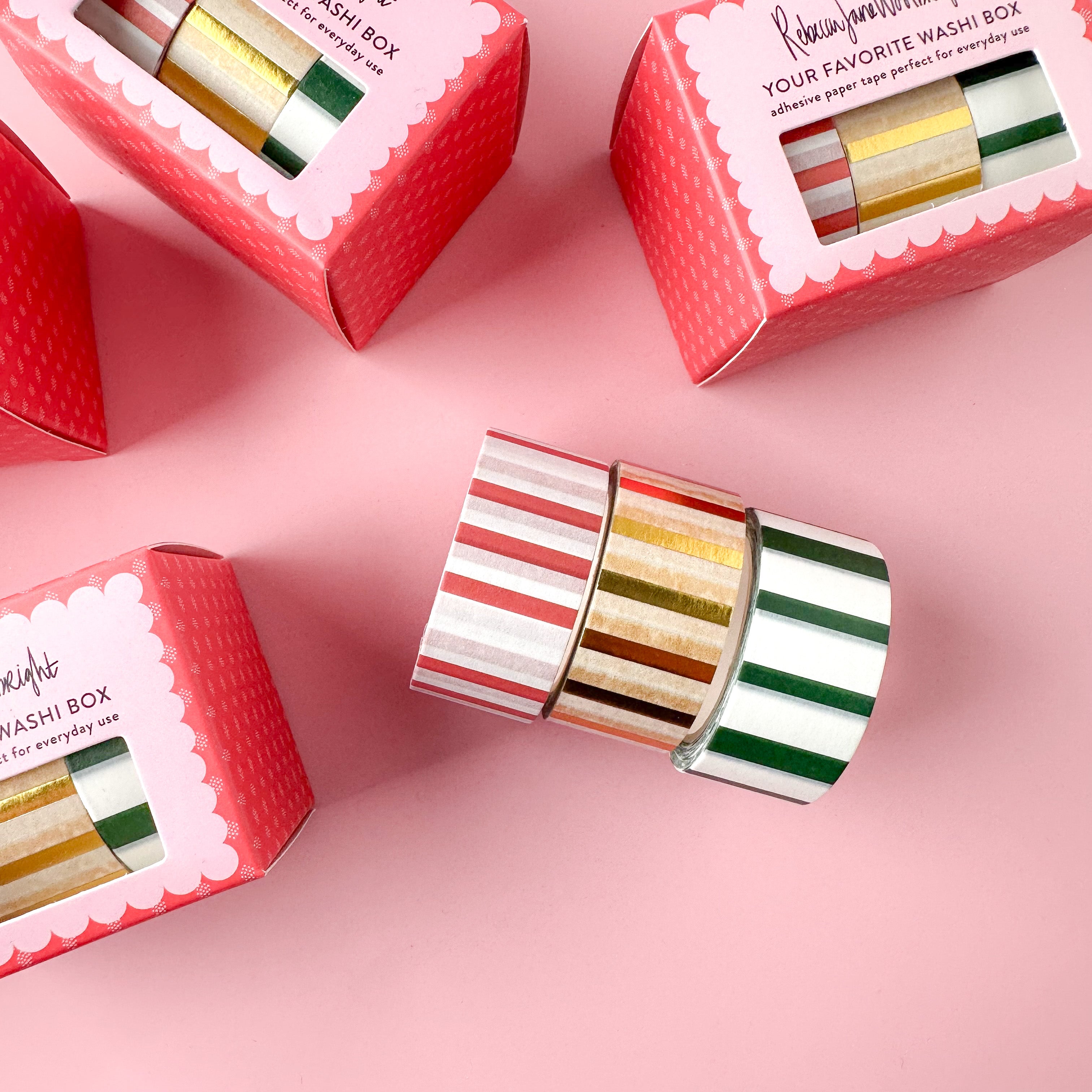 Favorites Holiday Stripe Washi Tape Set featuring a vibrant mix of festive stripes in traditional Christmas colors, ideal for adding a joyful and decorative touch to your holiday-themed crafts and projects. This set is from Rebecca Jane Woolbright and sold at BBB Supplies Craft Shop.