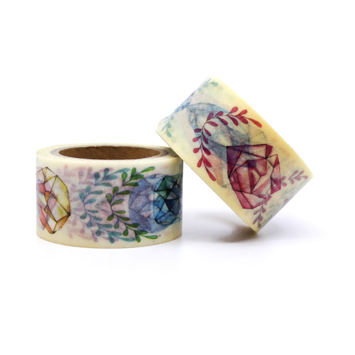 Rolls of aesthetic crystal and leaf watercolor washi tape on a white surface.