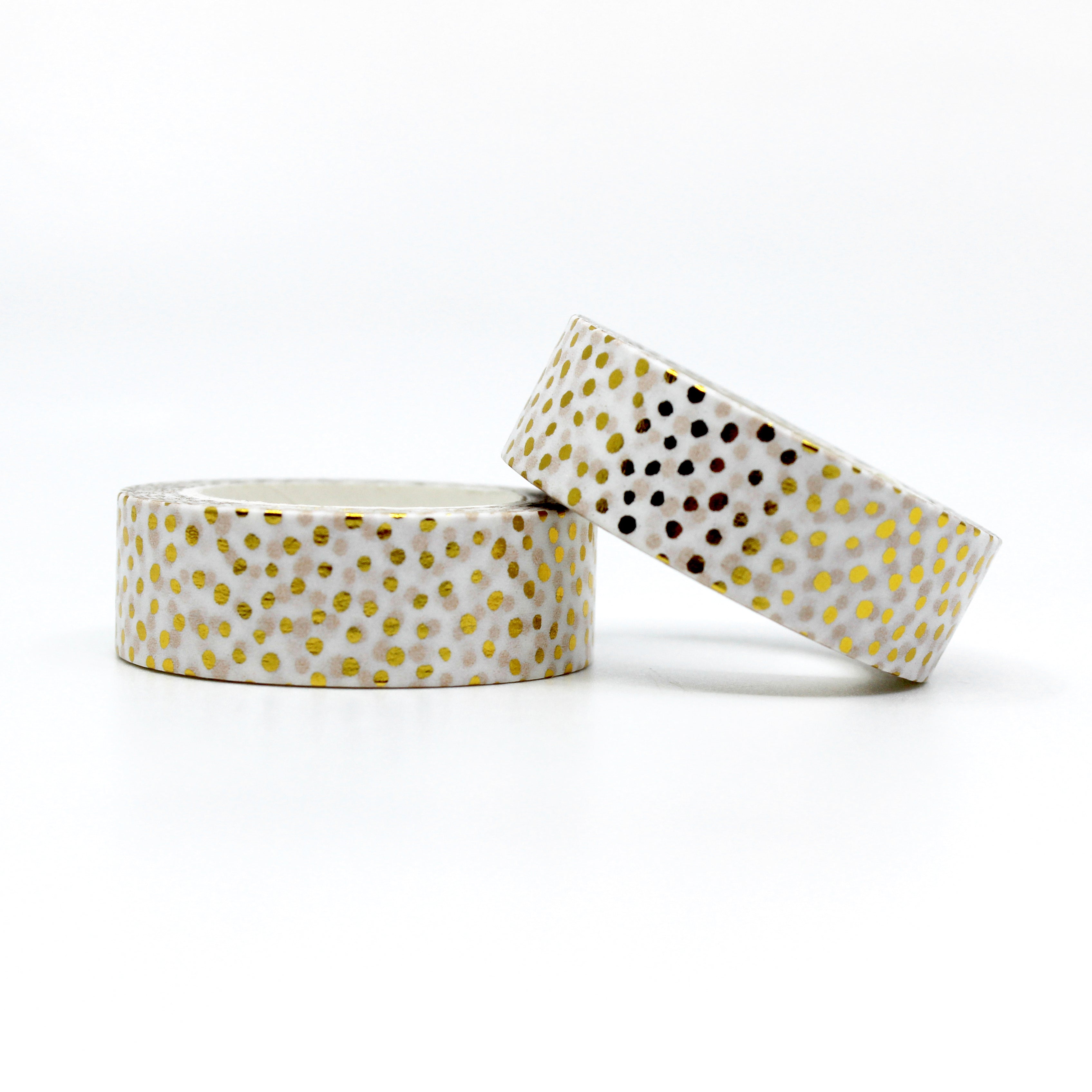 Elevate your crafts with our glamorous gold foil dotted washi tape adorned with playful polka dots and shimmering party confetti, perfect for adding a touch of joy and excitement. This tape is sold at BBB Supplies Craft Shop.