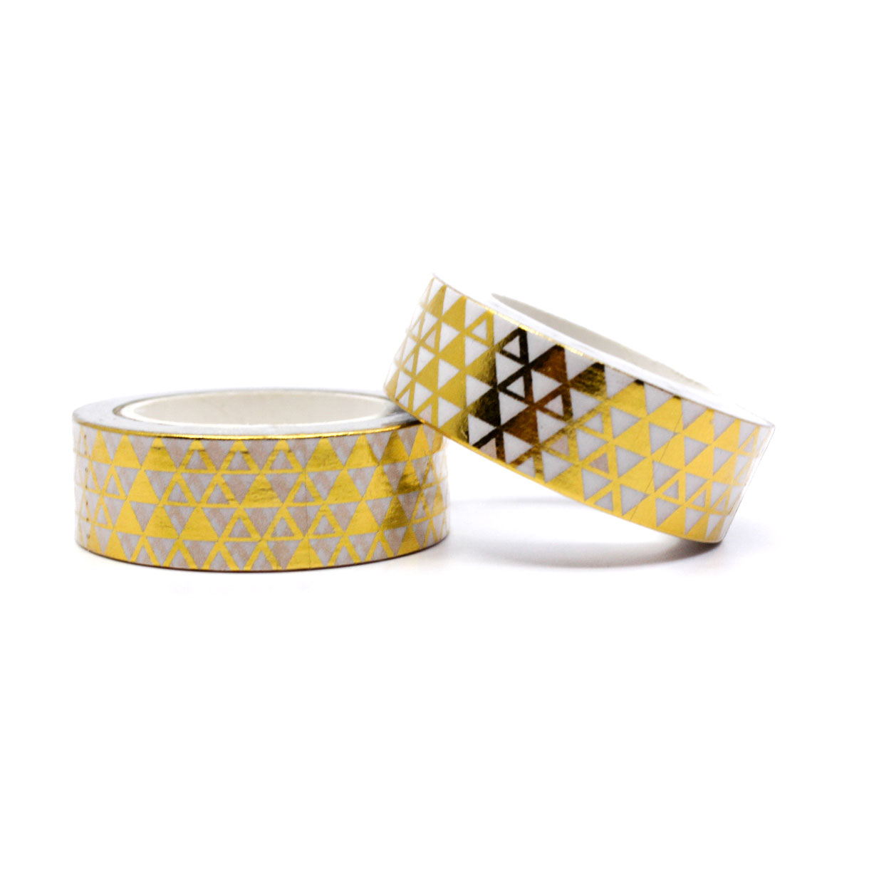 Gold patterned washi tape used on white paper for decoration.