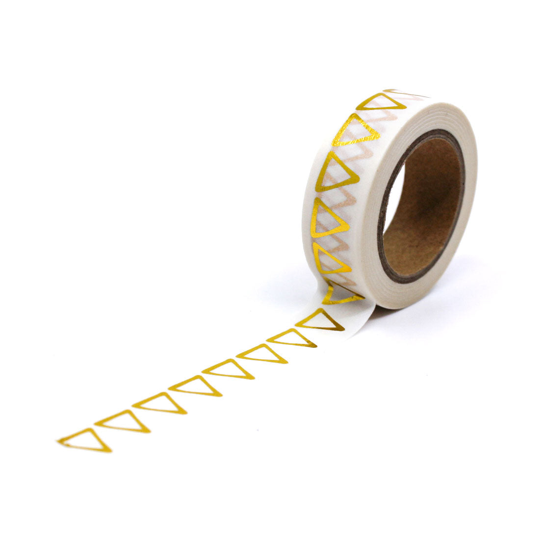 Close-up of chic geometric washi tape used in scrapbooking on soft peach background.