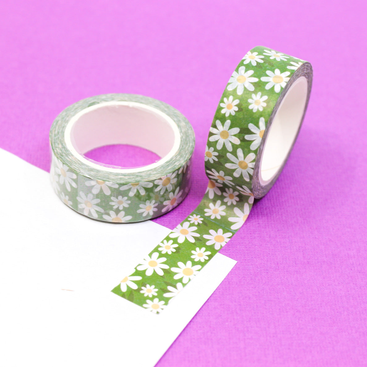 Green Daisy Flower Washi Tape: This washi tape features a beautiful green daisy flower pattern, adding a touch of nature's beauty to your crafts and projects. This tape is sold at BBB Supplies Craft Shop.