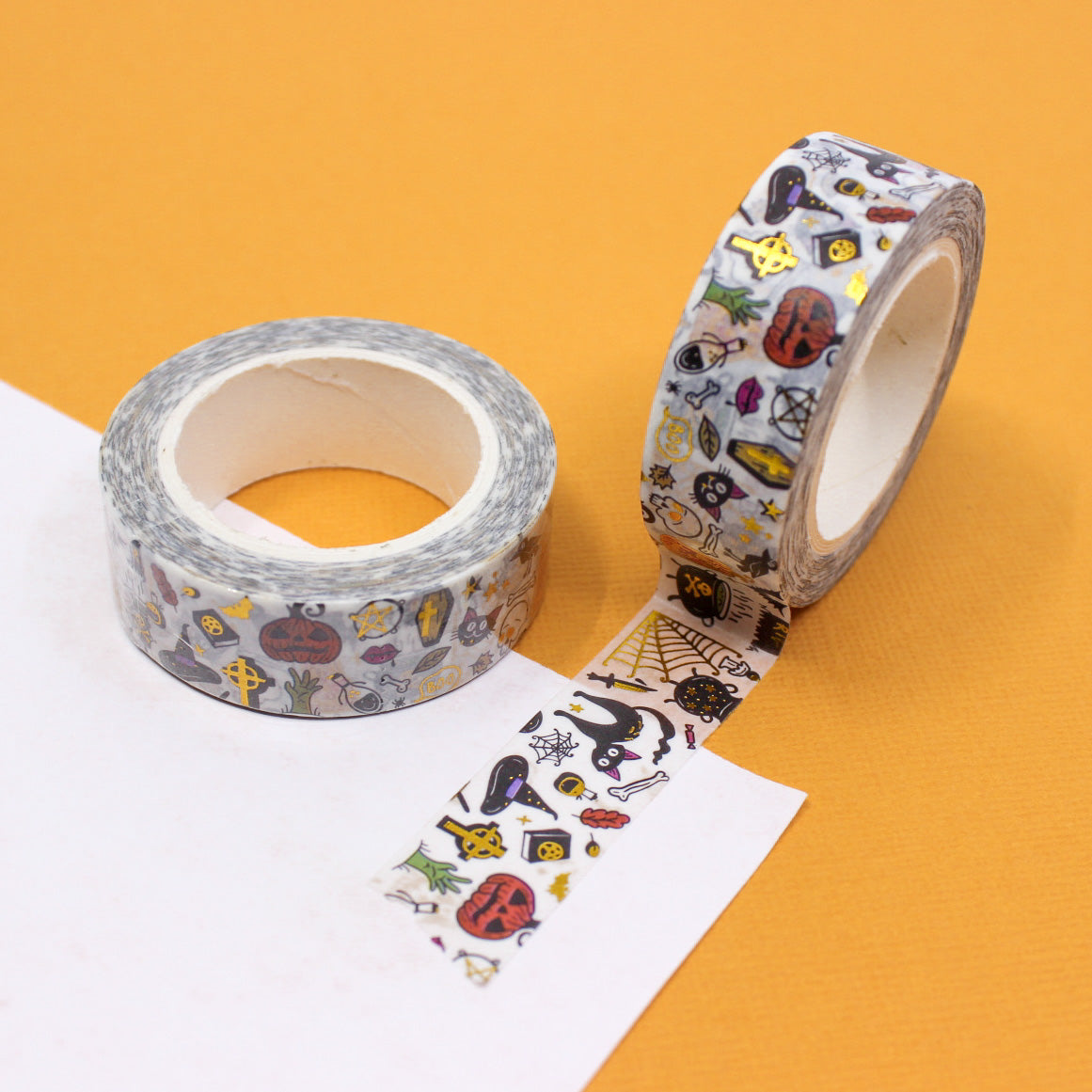 Elevate your Halloween crafts with our Gold Foil Halloween Objects Washi Tape, featuring a collection of spooky and stylish Halloween-themed illustrations in shimmering gold foil. Ideal for adding an elegant and festive touch to your projects. This tape is sold at BBB Supplies Craft Shop.