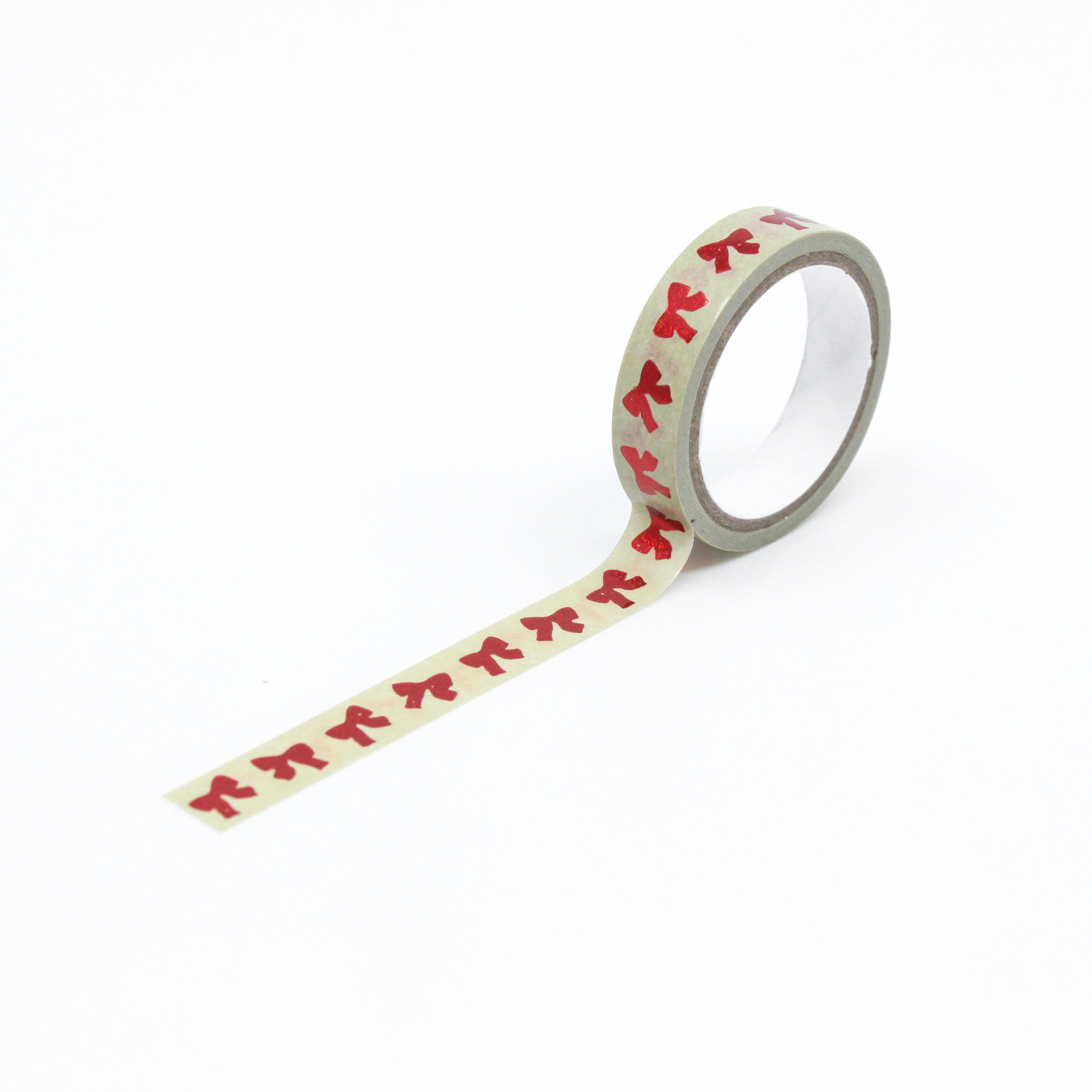 Infuse your creations with the magic of the holiday season using our washi tape adorned with classic red bow patterns, evoking the joy and festivity of holiday decorations. This tape is sold at BBB Supplies Craft Shop.