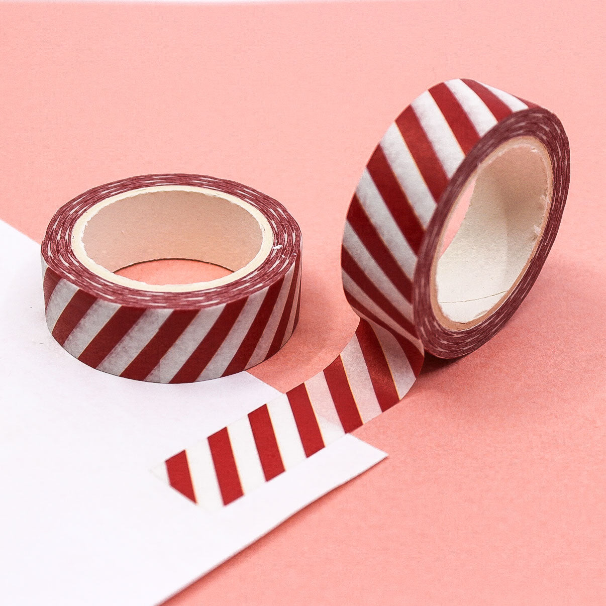 Red Diagonal Stripes Washi Tape with a bold and festive pattern, perfect for holiday crafts, gift wrapping, and planner decoration.