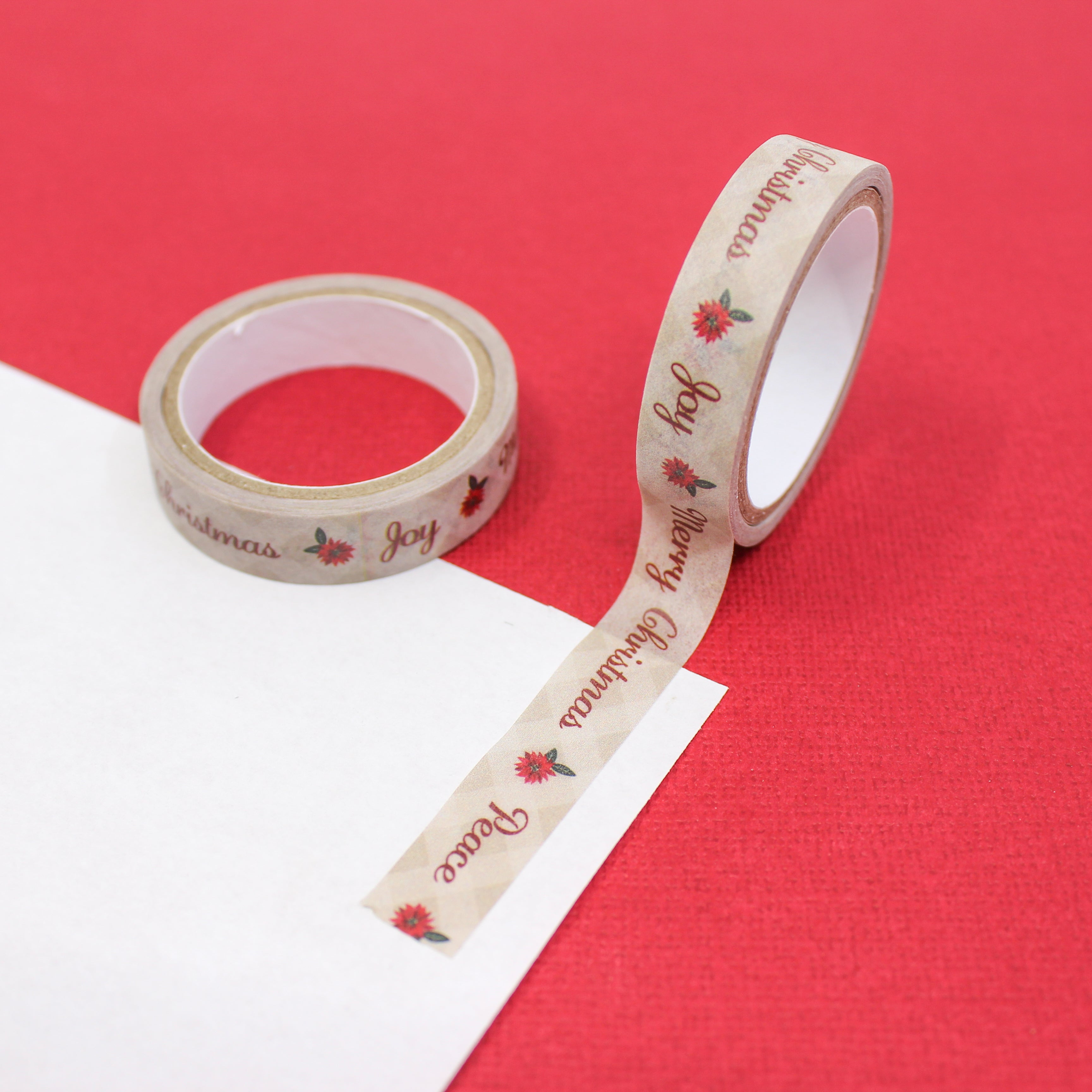 Elevate your holiday crafts with our Merry Christmas phrases washi tape, featuring joyful holiday greetings and phrases in festive typography, perfect for adding a touch of seasonal cheer to your projects. This tape is sold at BBB Supplies Craft Shop.