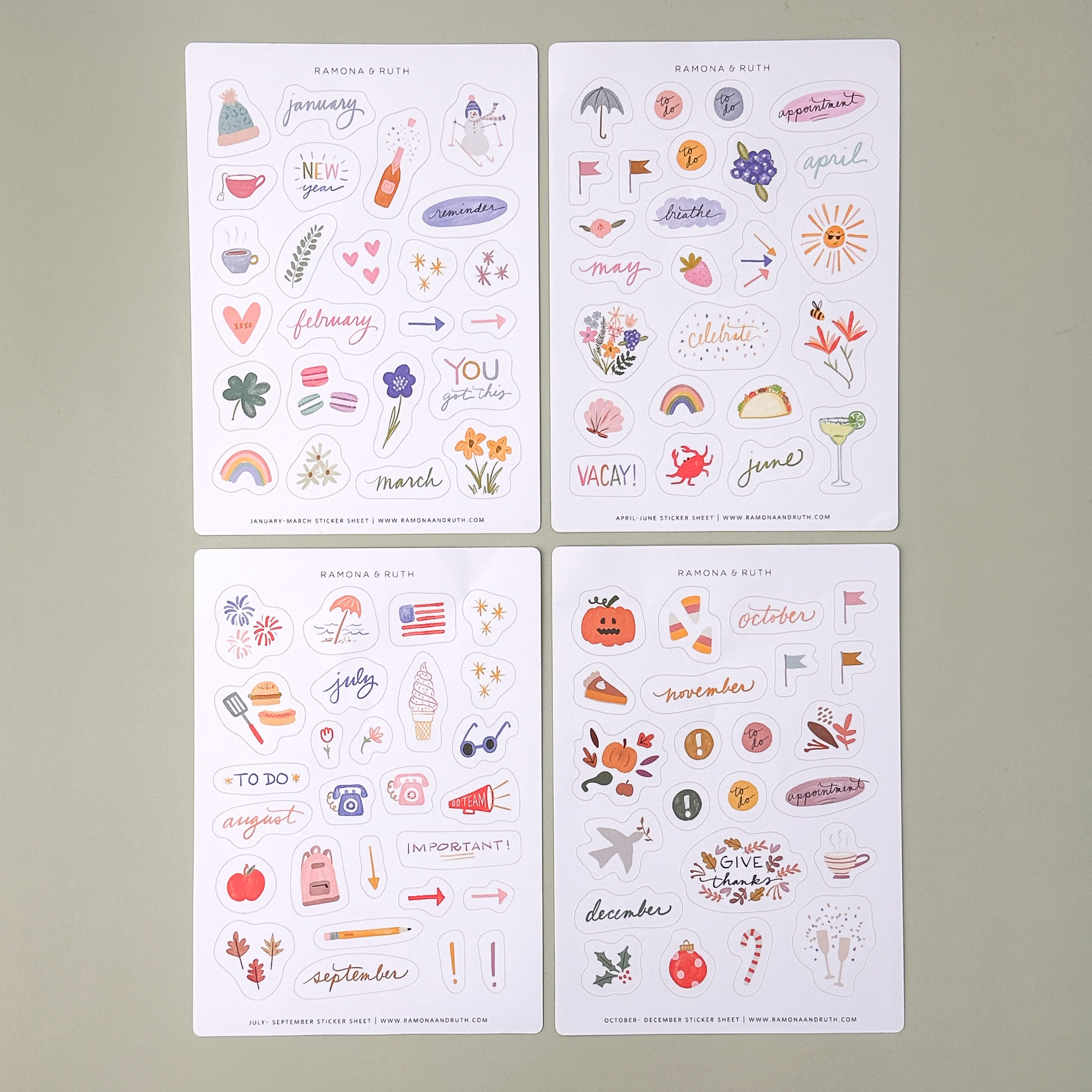 decorative sticker sheets showing all four designs with each unique season from that sticker sheet on a green background