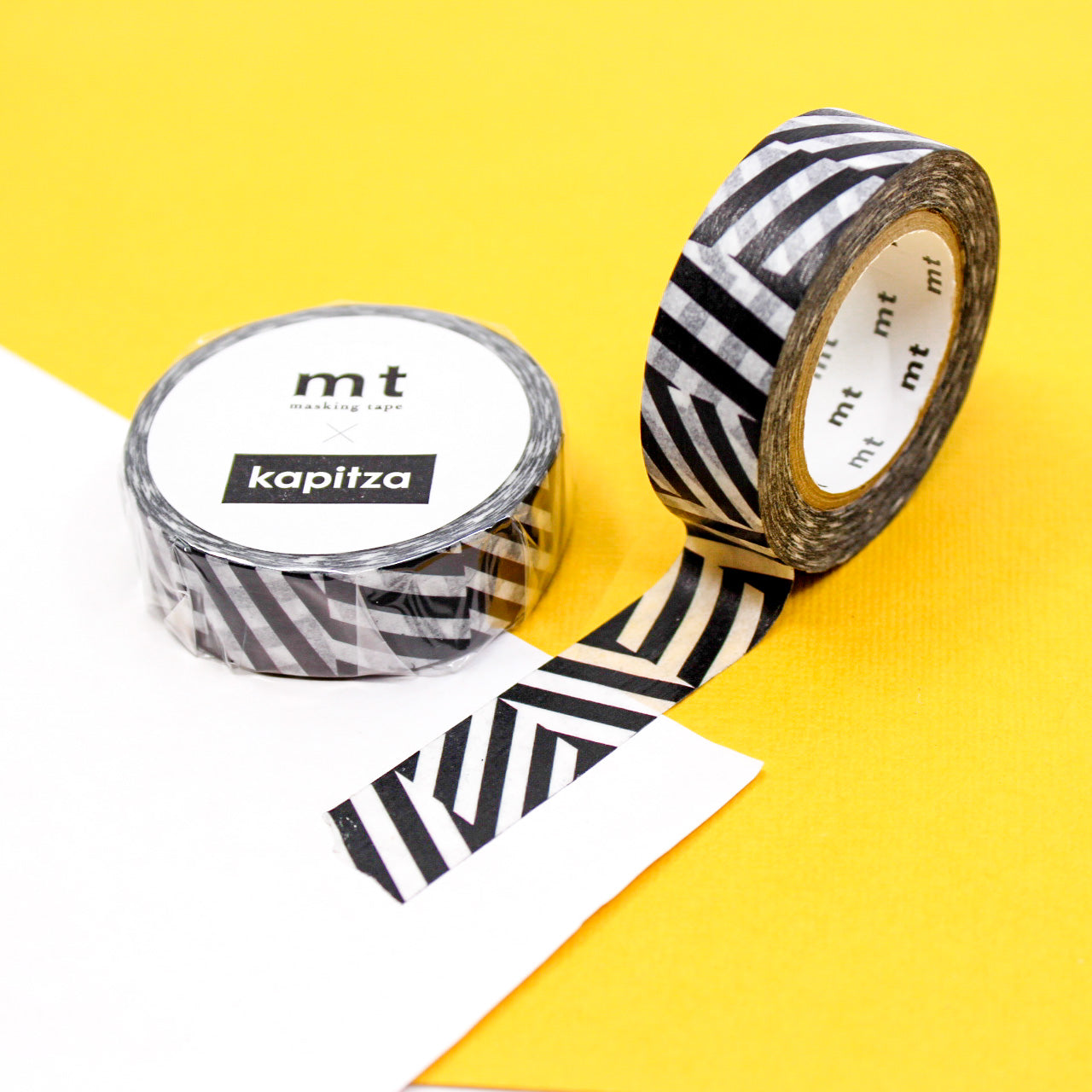 Elevate your creations with our captivating graphic black and white washi tape, showcasing eye-catching and intricate designs that create a dramatic and high-contrast effect for your crafts. From the design&nbsp;team of Kapitza, the MT tape Kapitza Seesaw washi is sold at BBB Supplies Craft Shop.
