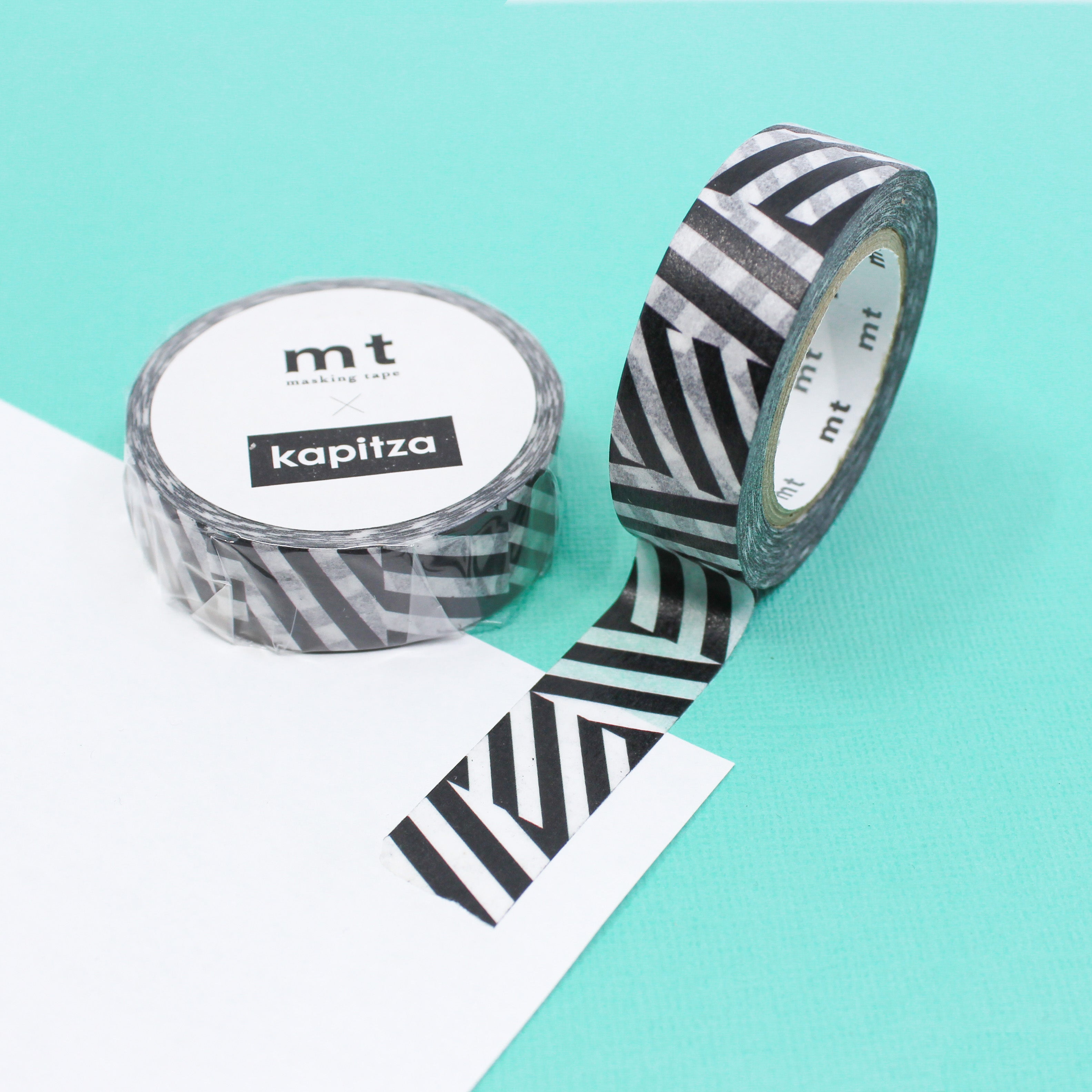 Elevate your creations with our captivating graphic black and white washi tape, showcasing eye-catching and intricate designs that create a dramatic and high-contrast effect for your crafts. From the design&nbsp;team of Kapitza, the MT tape Kapitza Seesaw washi is sold at BBB Supplies Craft Shop.