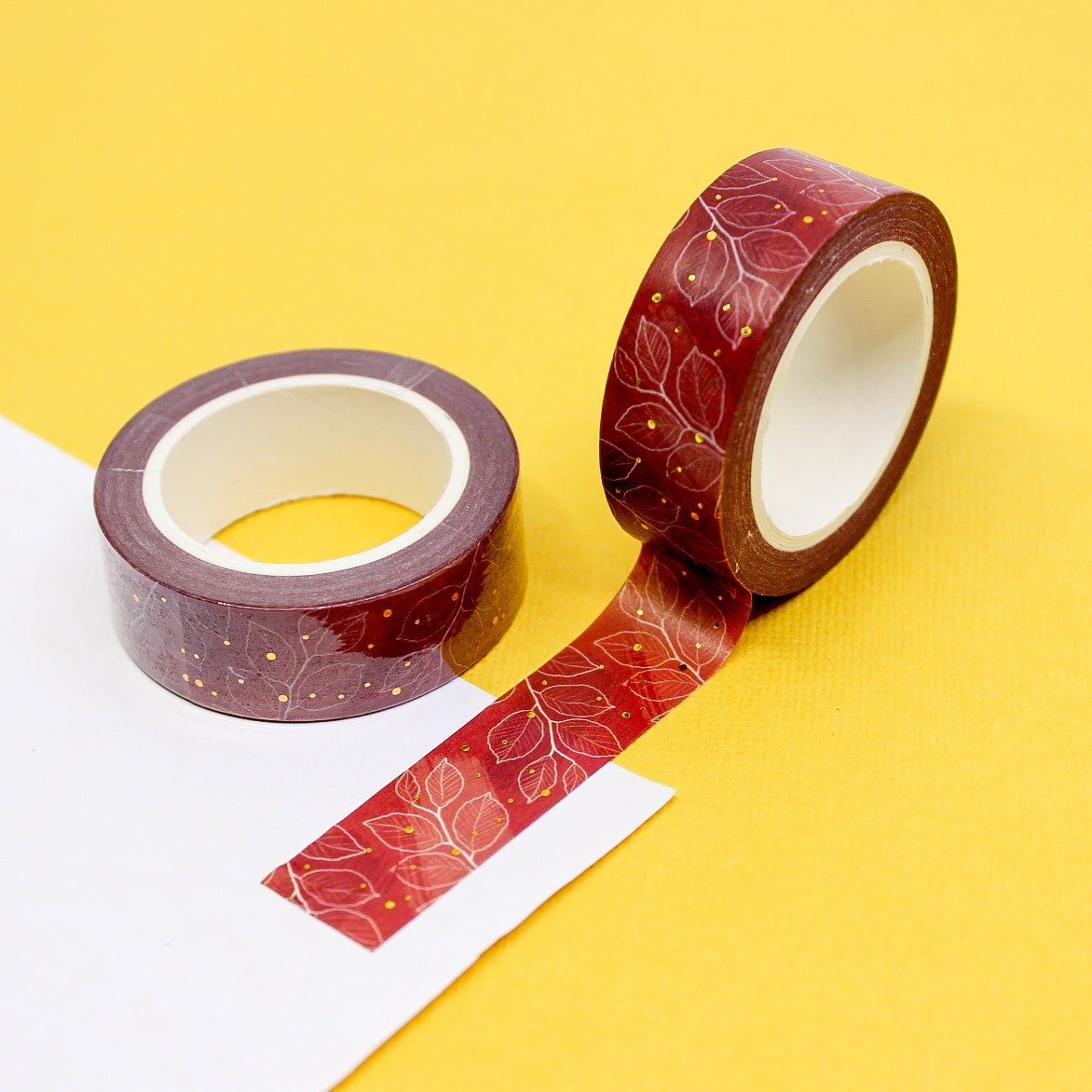 Add a touch of elegance to your projects with this exquisite washi tape. Featuring a rich maroon color with intricate gold foil leaf motifs, this tape is perfect for adding a luxurious accent to your crafts. This tape is sold at BBB Supplies Craft Shop.