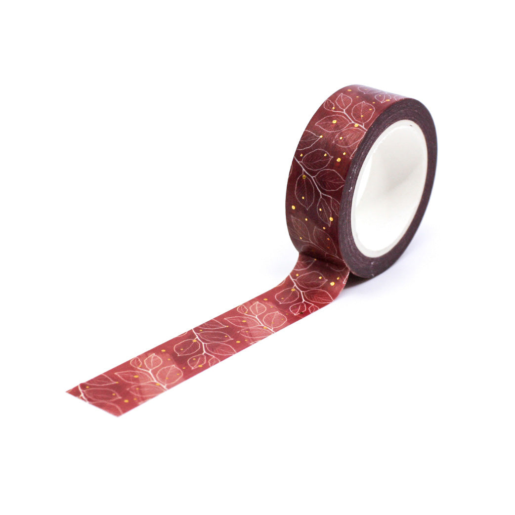 Add a touch of elegance to your projects with this exquisite washi tape. Featuring a rich maroon color with intricate gold foil leaf motifs, this tape is perfect for adding a luxurious accent to your crafts. This tape is sold at BBB Supplies Craft Shop.