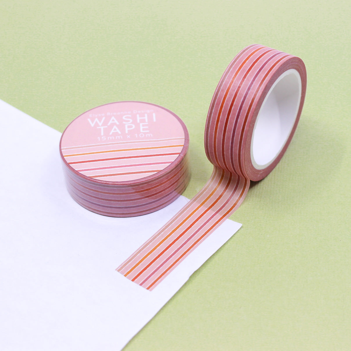 Colorful Peachy Pink Stripes Washi Tape: Cheerful, striped tape featuring peachy pink hues, perfect for adding a lively touch to your crafts, planners, and journals. This tape is from Elyse Breanne Designs and sold at BBB Supplies Craft SHop.