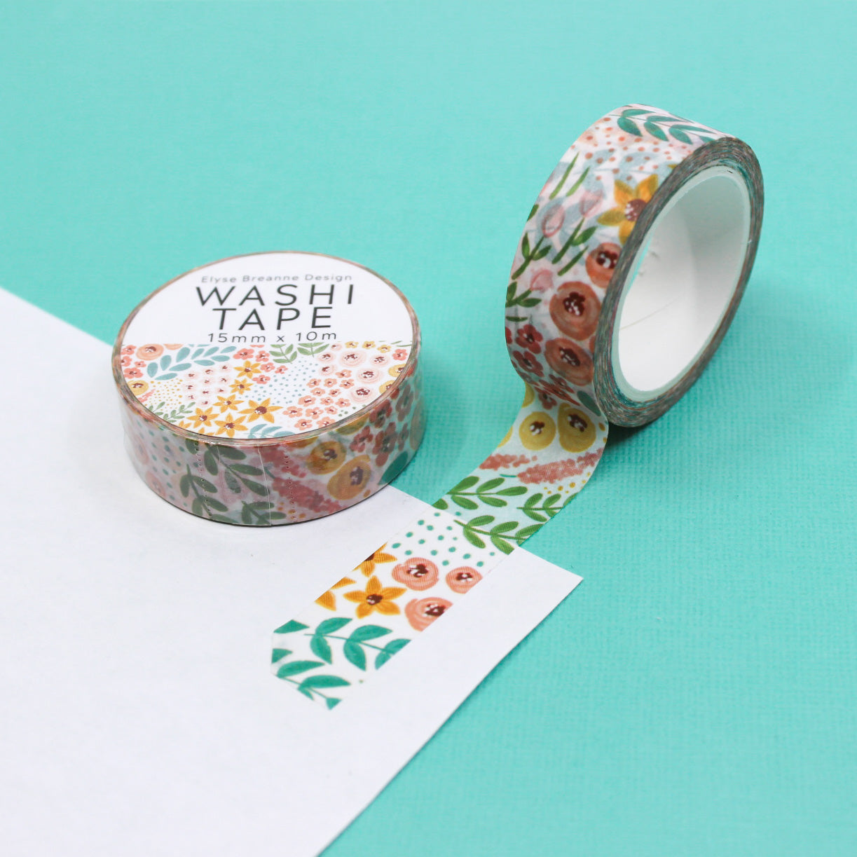 Modern White Summer Floral Washi Tape: Elegant white tape adorned with vibrant summer flowers, perfect for enhancing your planners, journals, and craft projects with a fresh, seasonal touch. This tape is from Elyse Breanne Designs and sold at BBB Supplies Craft Shop.