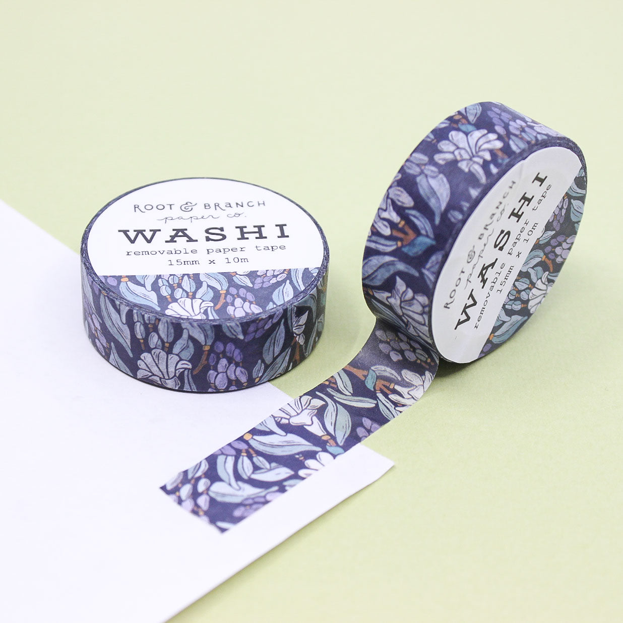 This blue Moonlight Tuberose Floral Washi Tape brings a dreamy, serene vibe to your crafts with its delicate depiction of tuberose blooms under a soft blue moonlit sky. The intricate floral design paired with deep blue hues evokes a sense of calm and elegance, making it perfect for enhancing journals, planners, or DIY projects.