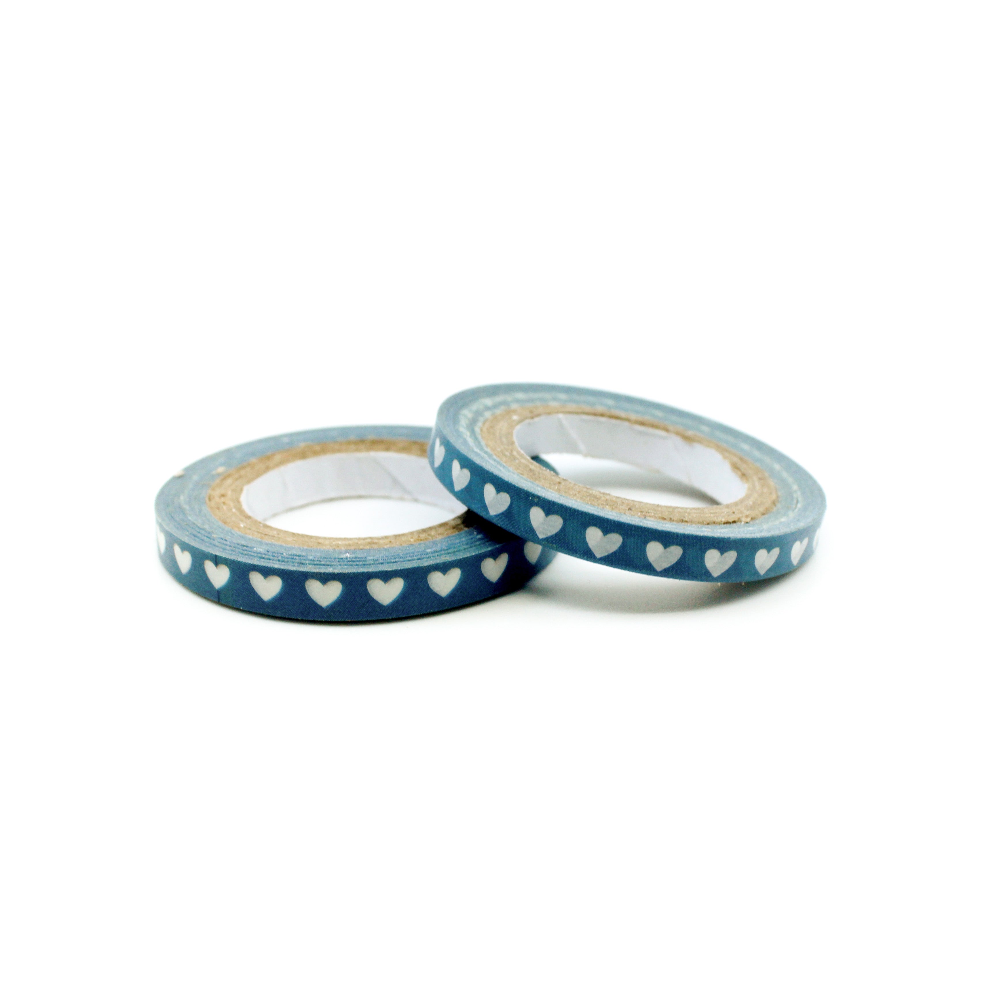 Elevate your crafts with our Narrow Blue Hearts Washi Tape, featuring a charming heart pattern in a calming shade of blue. Ideal for adding a sweet and decorative touch to your projects. This tape is sold at BBB Supplies Craft Shop.