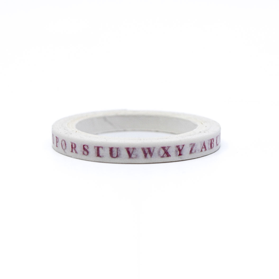 Pastel pink A–Z alphabet washi tape displayed beside matching packaging.