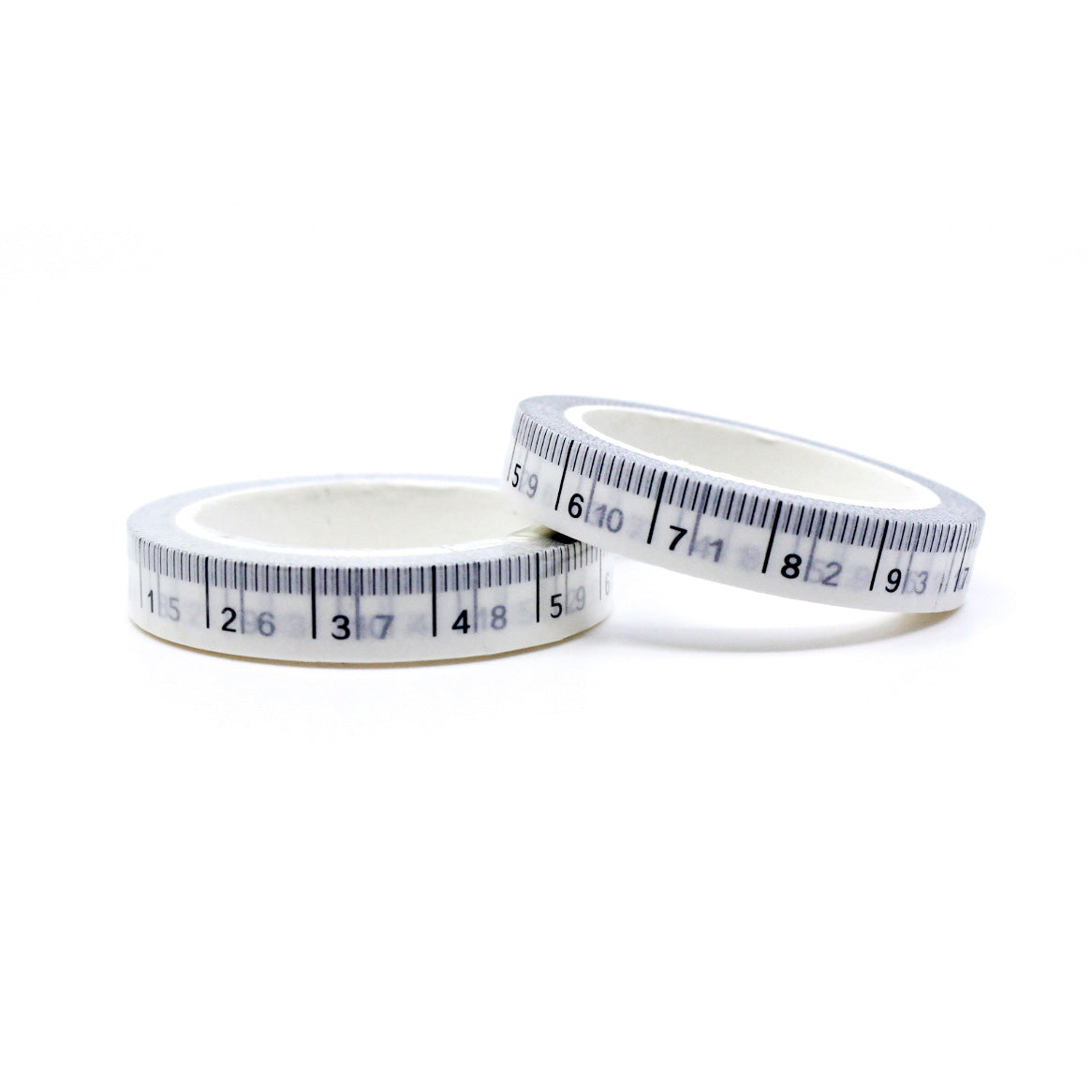 This washi tape features a design resembling a tape measure, perfect for adding a touch of creativity to your crafting or journaling projects. This tape is sold at BBB Supplies Craft Shop.