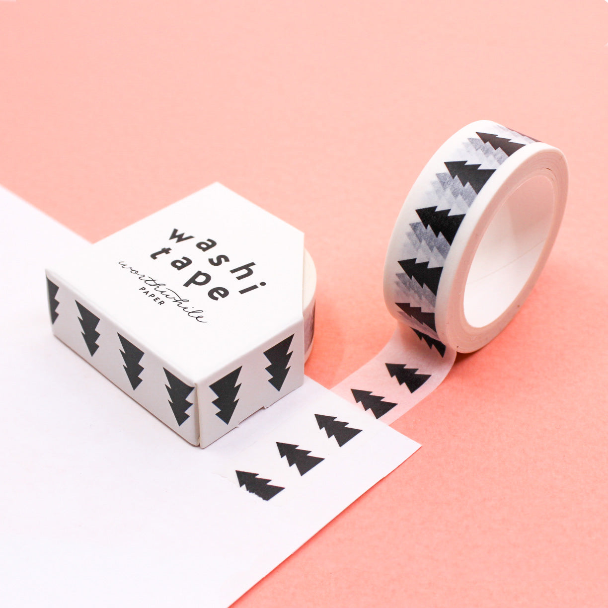 Black and White Nordic Holiday Pine Tree Washi Tape, featuring a charming winter design with stylized pine trees, ideal for adding a touch of Scandinavian elegance to your festive crafts and holiday-themed projects. This tape is from Worthwhile Paper and sold at BBB Supplies Craft Shop.