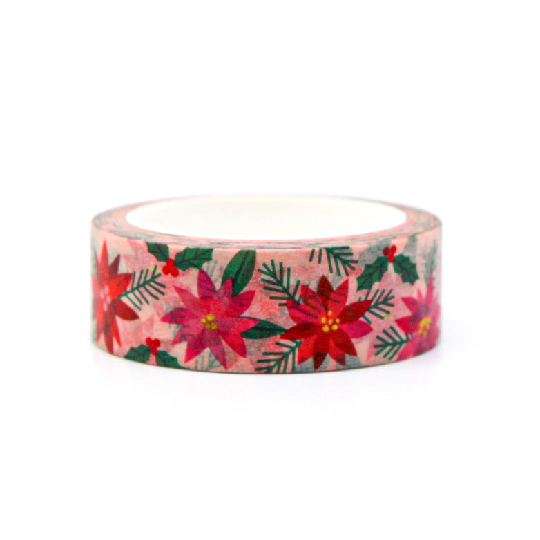 Festive washi tape roll featuring poinsettia flowers and holly leaves — perfect for planners and crafts.