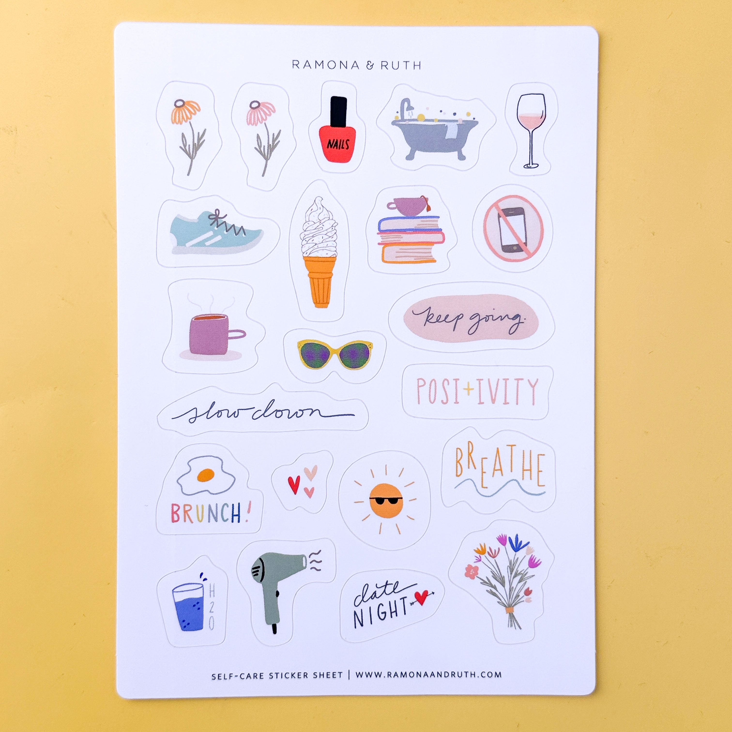 Sheet of self-care stickers with various illustrations on a yellow background