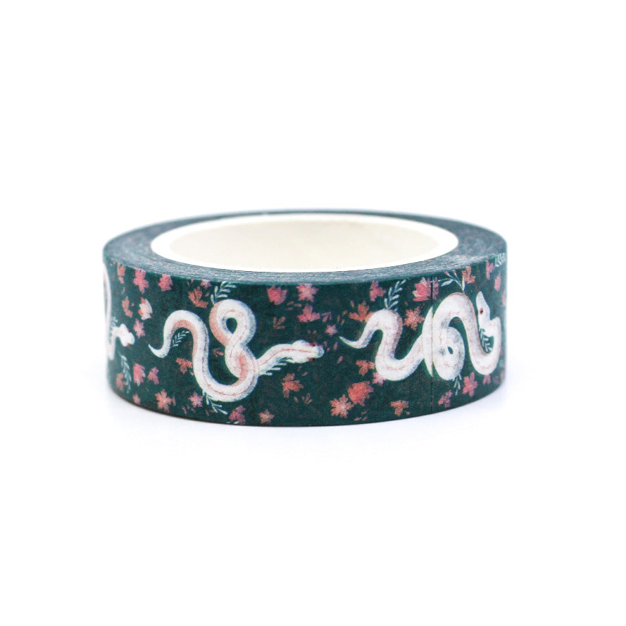 Unleash a touch of mystique with our floral snake pattern washi tape, featuring a unique fusion of floral motifs and sinuous snake designs, perfect for adding an intriguing and artistic element to your crafts. This tape is sold at BBB Supplies Craft Shop.