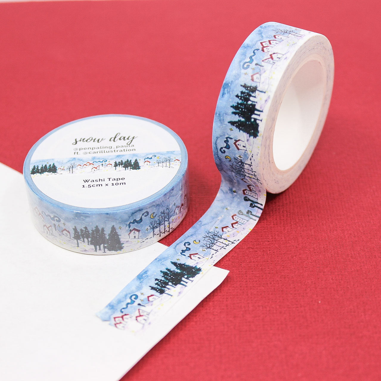 Cute winter washi tape featuring frosty houses and pine trees for cozy journaling and planner decoration.