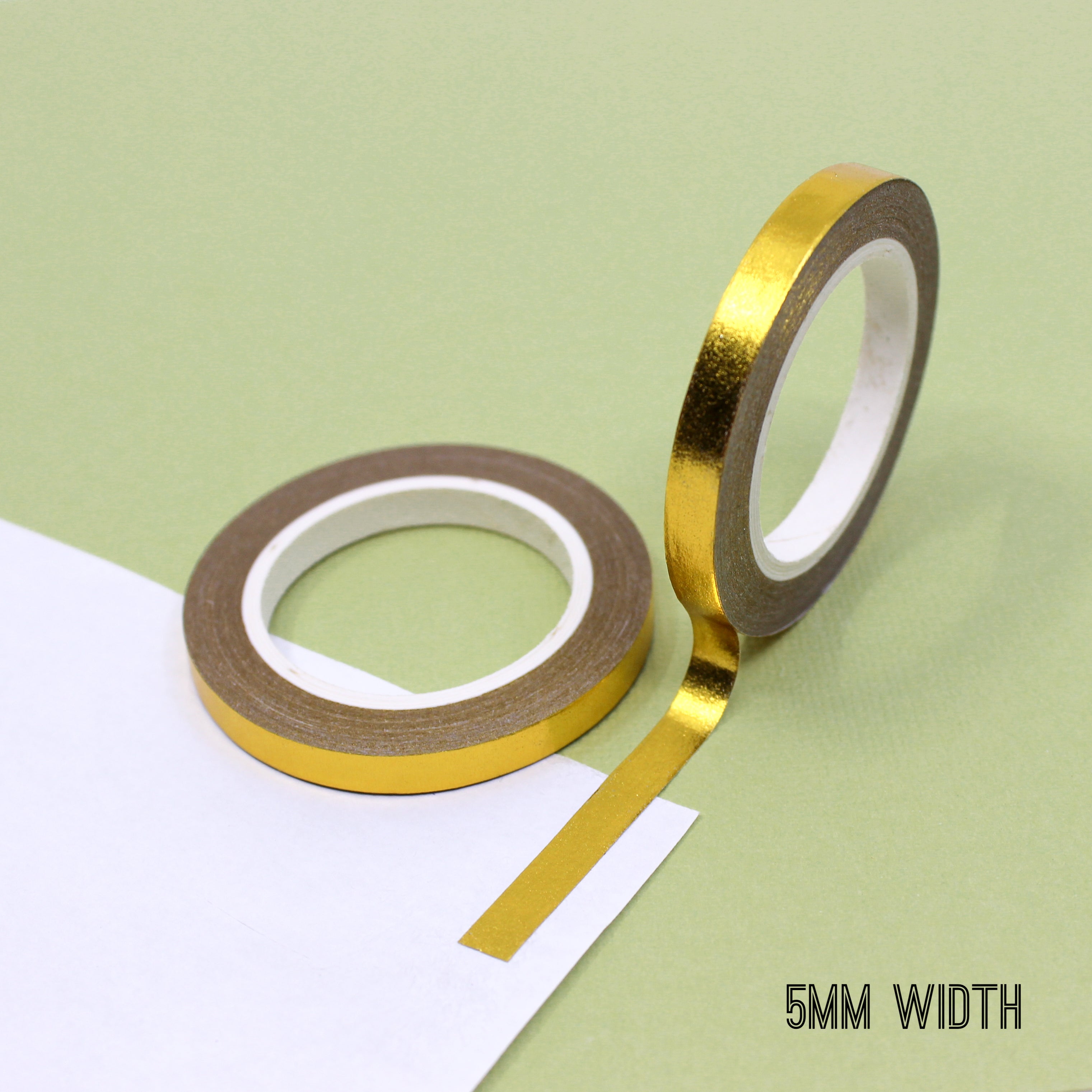 Elevate your creations with our captivating solid foil gold washi tape, showcasing a smooth and shiny surface in a radiant gold color, perfect for adding a touch of opulence and sophistication. These solid foil tapes are sold exclusively at BBB Supplies Craft Shop.