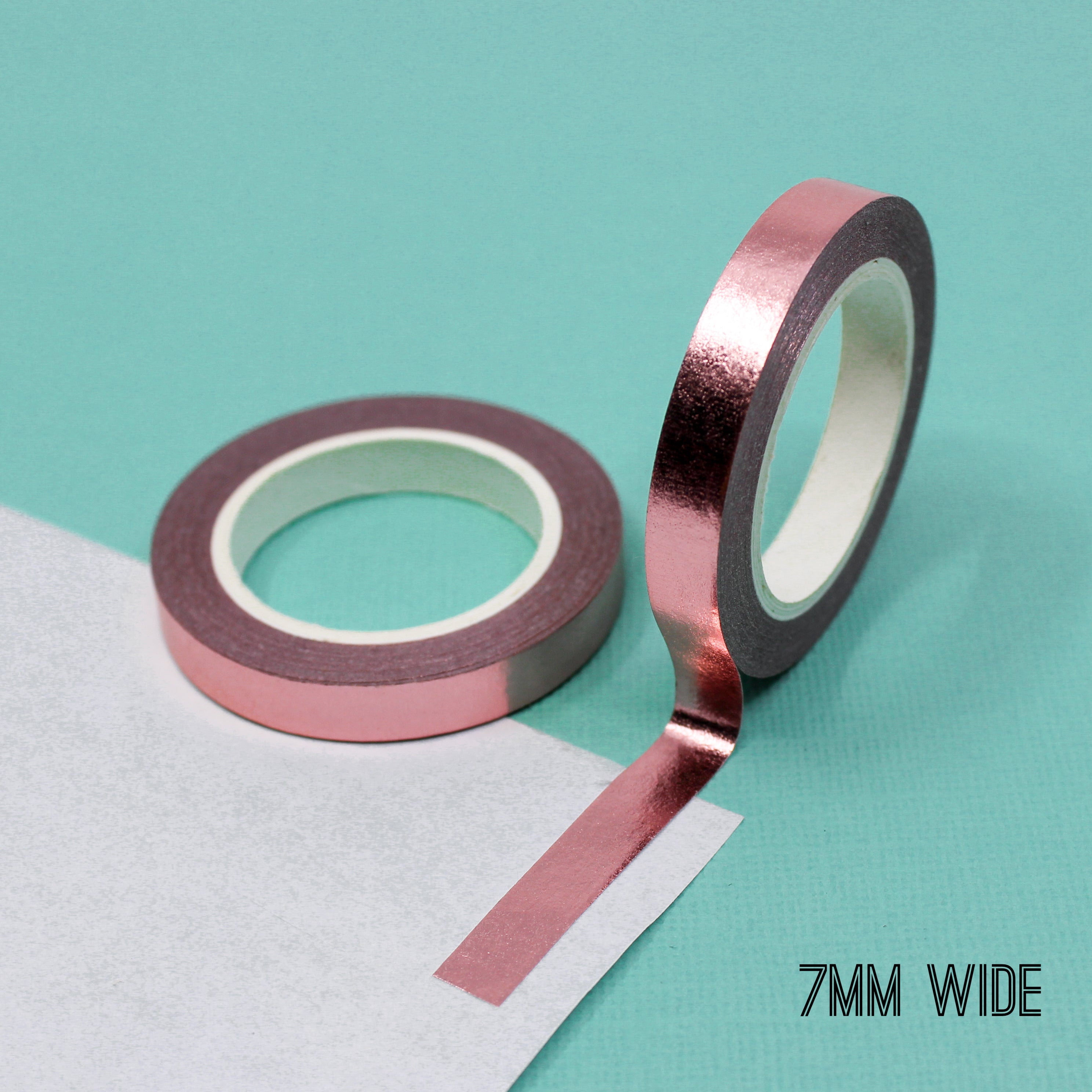 Elevate your creations with our captivating solid foil rose gold washi tape, showcasing a smooth and shiny surface in a radiant gold color, perfect for adding a touch of opulence and sophistication. This tape is sold exclusively at BBB Supplies Craft Shop.