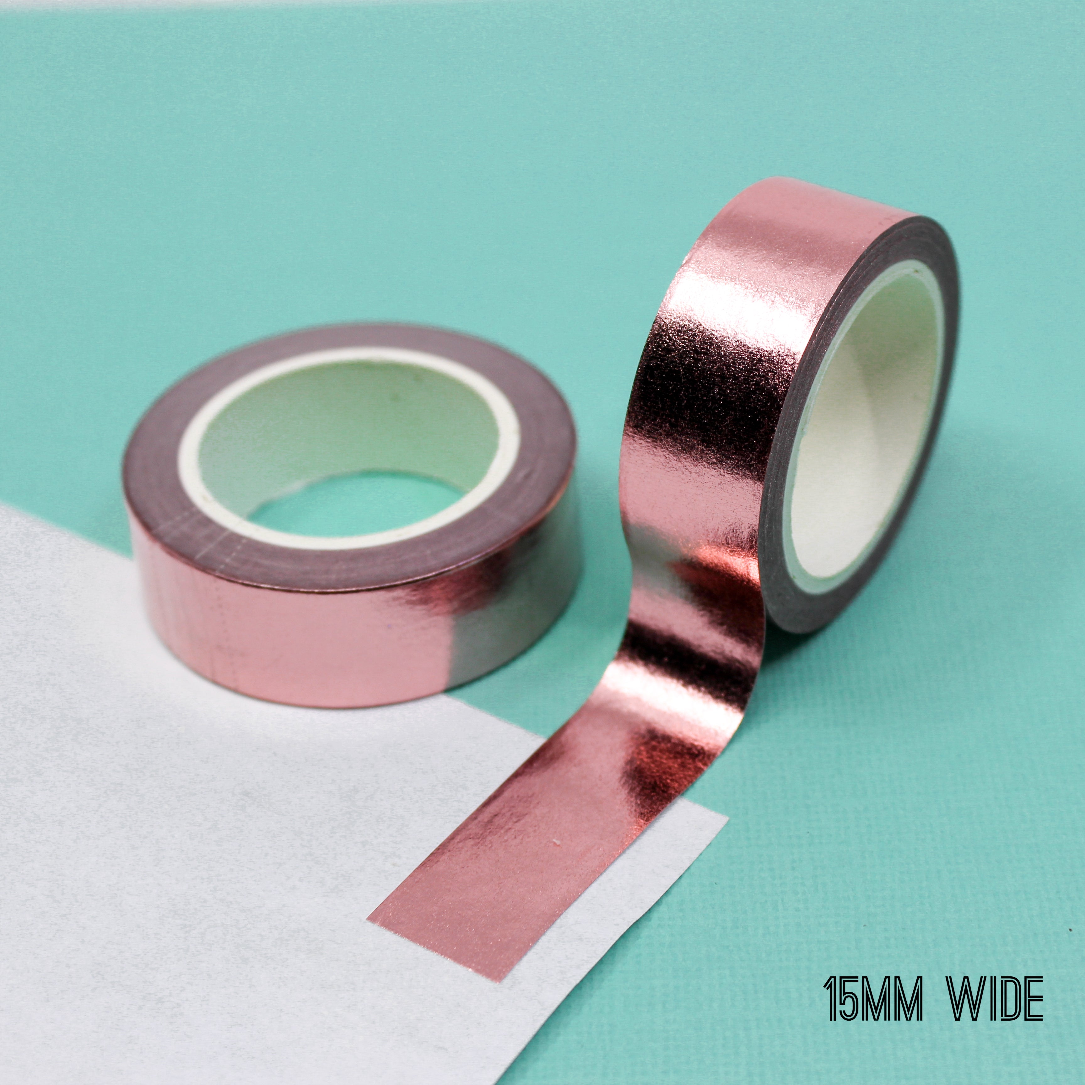 Elevate your creations with our captivating solid foil rose gold washi tape, showcasing a smooth and shiny surface in a radiant gold color, perfect for adding a touch of opulence and sophistication. This tape is sold exclusively at BBB Supplies Craft Shop.