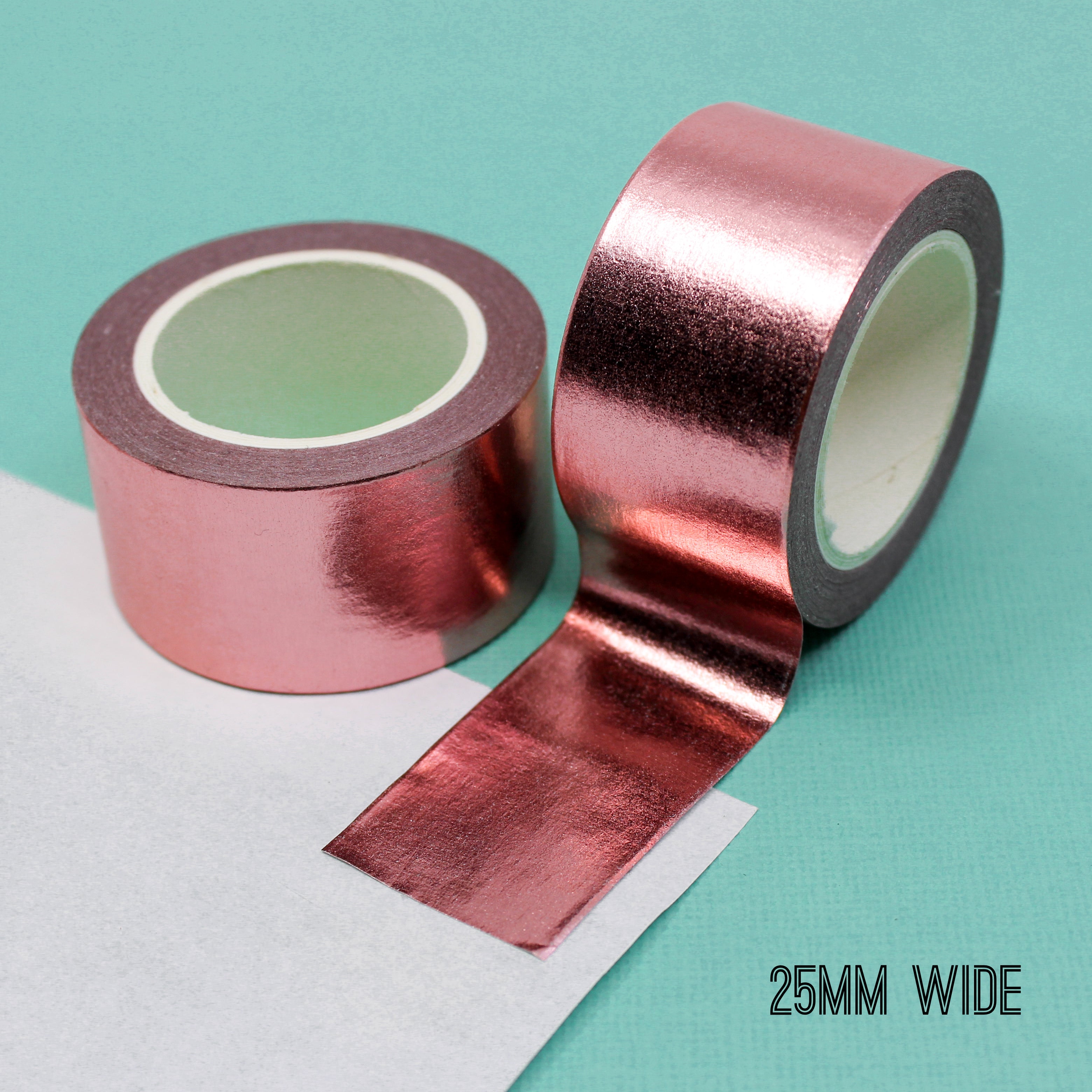Elevate your creations with our captivating solid foil rose gold washi tape, showcasing a smooth and shiny surface in a radiant gold color, perfect for adding a touch of opulence and sophistication. This tape is sold exclusively at BBB Supplies Craft Shop.