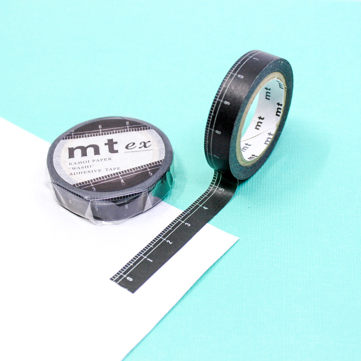 Stay organized with our thin black ruler washi tape, featuring a sleek design that mimics the appearance of a ruler, perfect for adding a practical and minimalist touch to your crafts. This tape is from MT Brand Washi tape and sold at BBB Supplies Craft Shop.