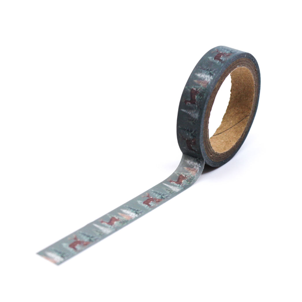 Decorative tape featuring watercolor deer and winter trees on gray.