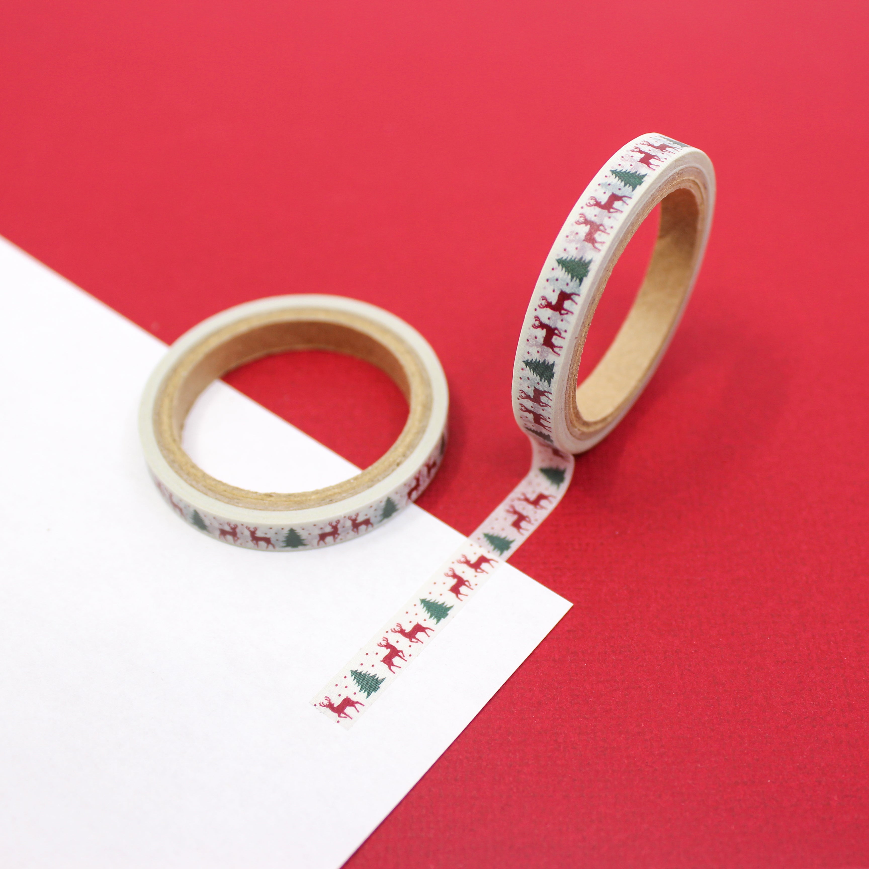 "Infuse your creations with the spirit of vintage Christmas using our Washi tape adorned with classic reindeer and Christmas tree motifs, capturing the warmth and nostalgia of holiday traditions. This tape is sold at BBB Supplies Craft Shop.