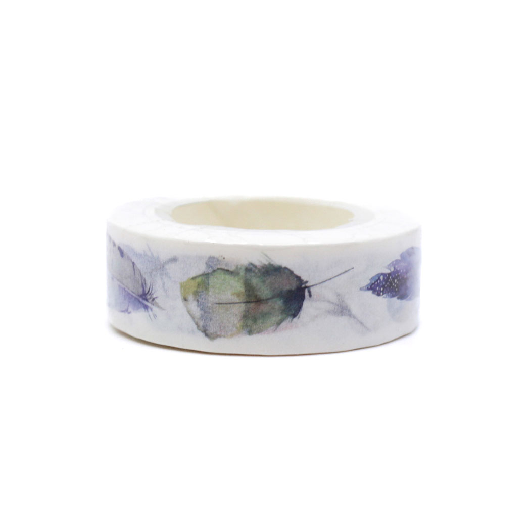 lose-up of pastel watercolor feather design on journaling washi tape.