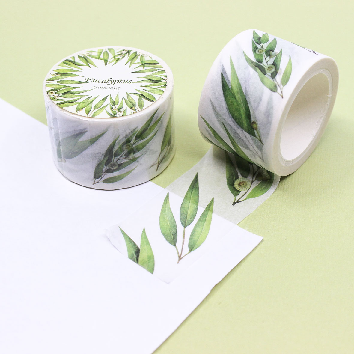 Wide washi tape featuring a delicate olive branch leaf pattern, ideal for nature-themed crafts, journaling, and decorative accents.