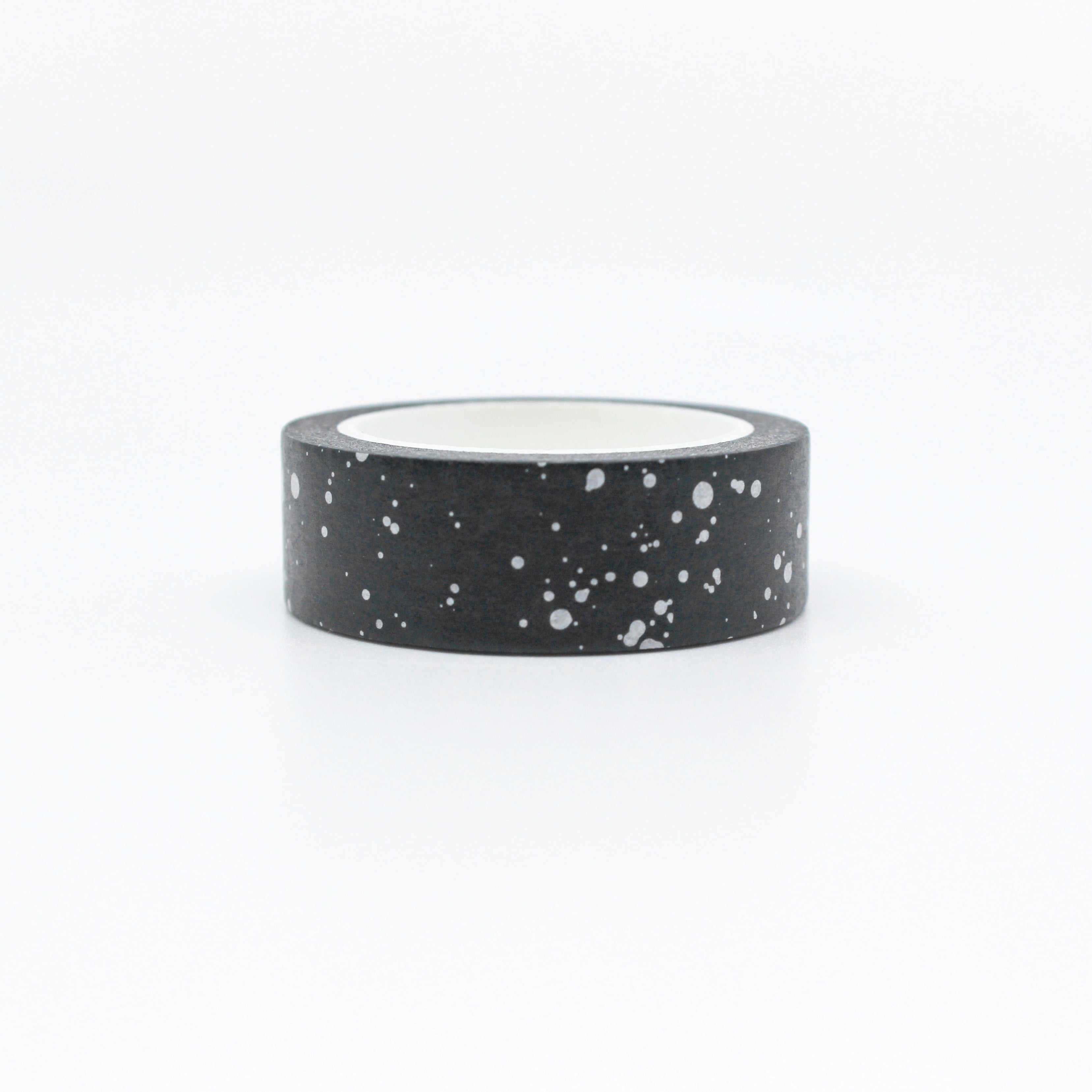 This photo is of a modern and fun black and white paint splatter speckled dots washi tape from BBB Supplies craft and journaling shop.