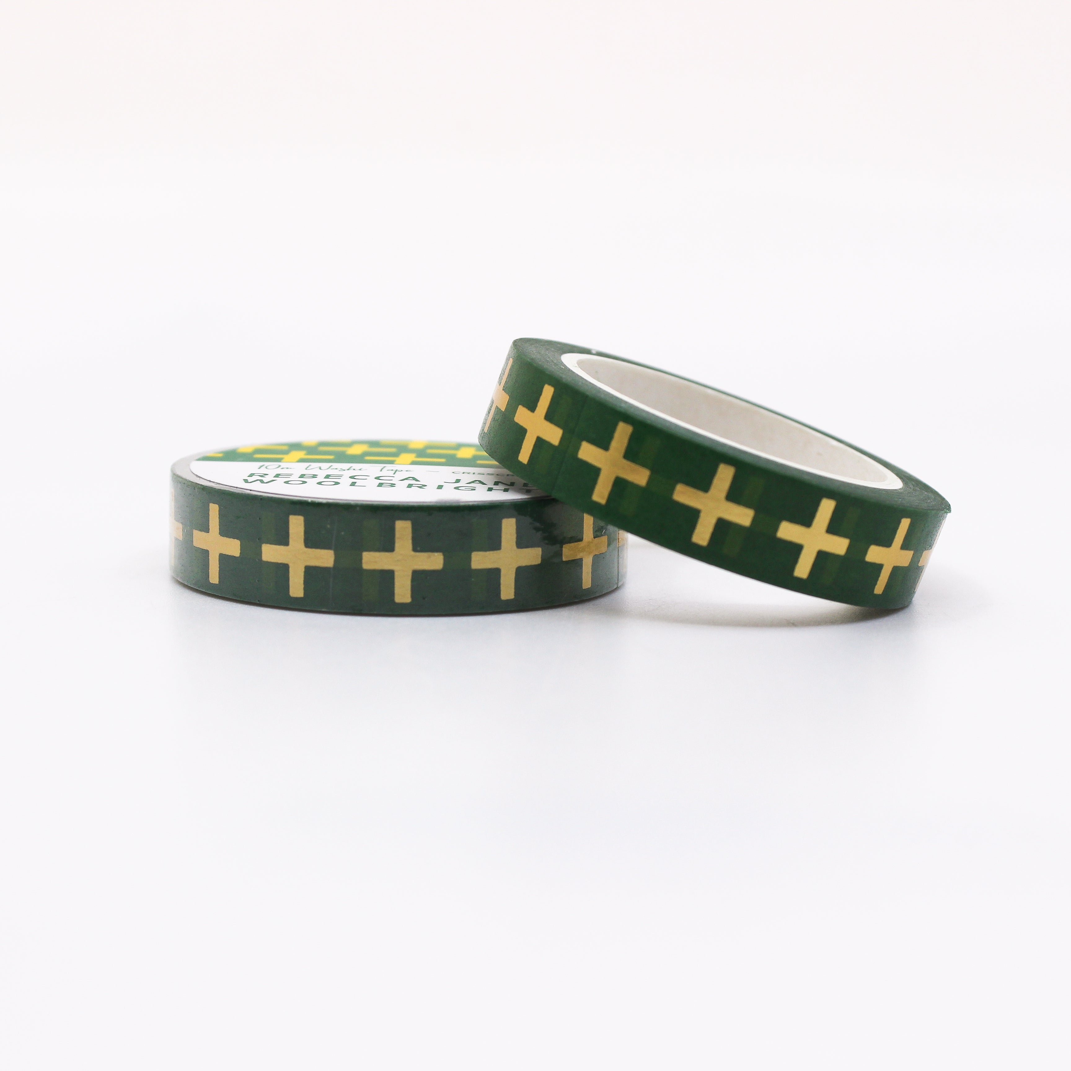 This is a roll of yellow swiss cross with green background washi tapes from BBB Supplies Craft Shop