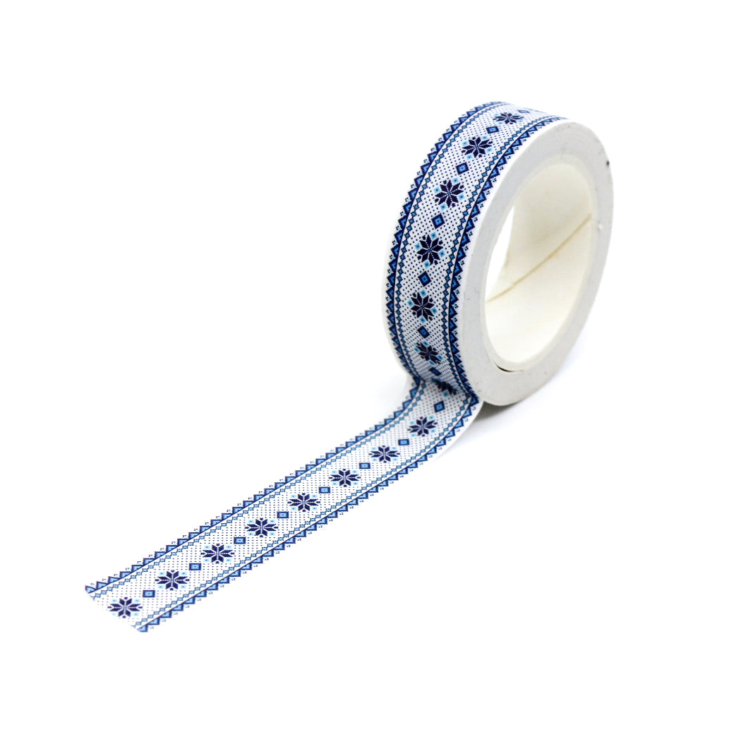 This cute blue washi tape is perfect for sweater weather. The blue and white winter cross stitch pattern will bring joy to any craft project, BUJO or planner spread. This tape is sold at BBB Supplies Craft Shop.